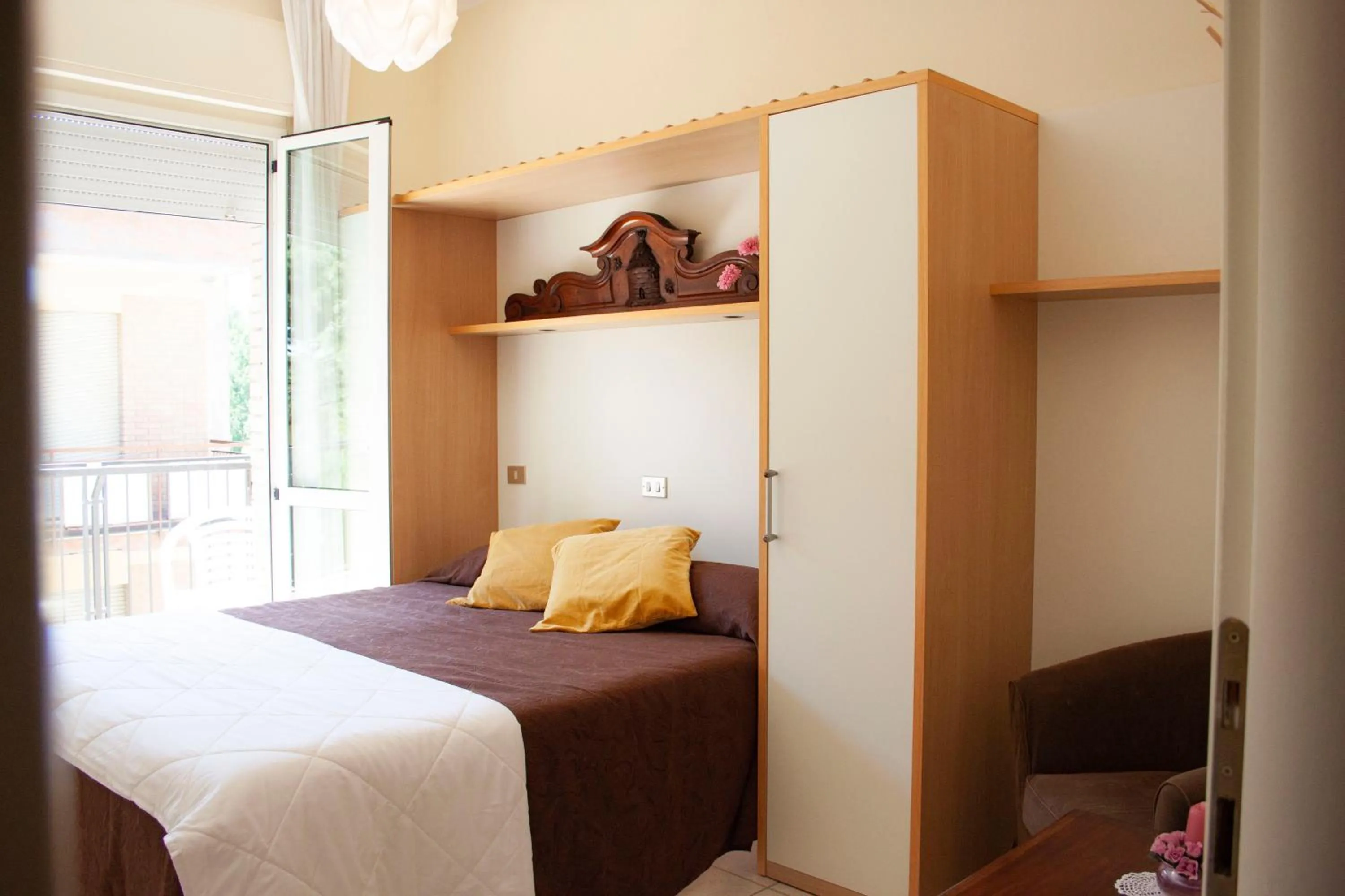 Bed in Hotel Loretta & Dependance