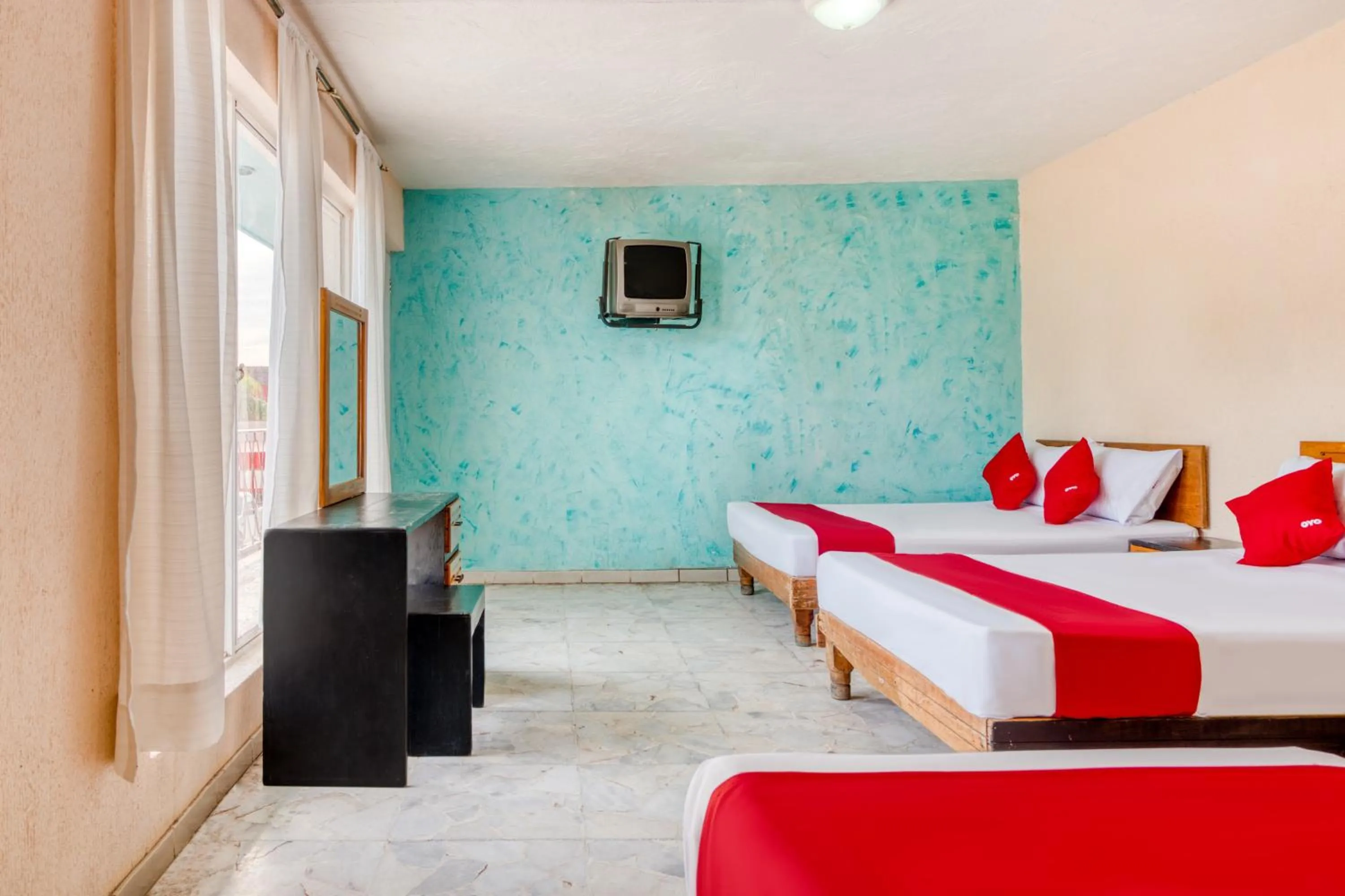 Bedroom in Capital O Hotel La Siesta, Gomez Palacio