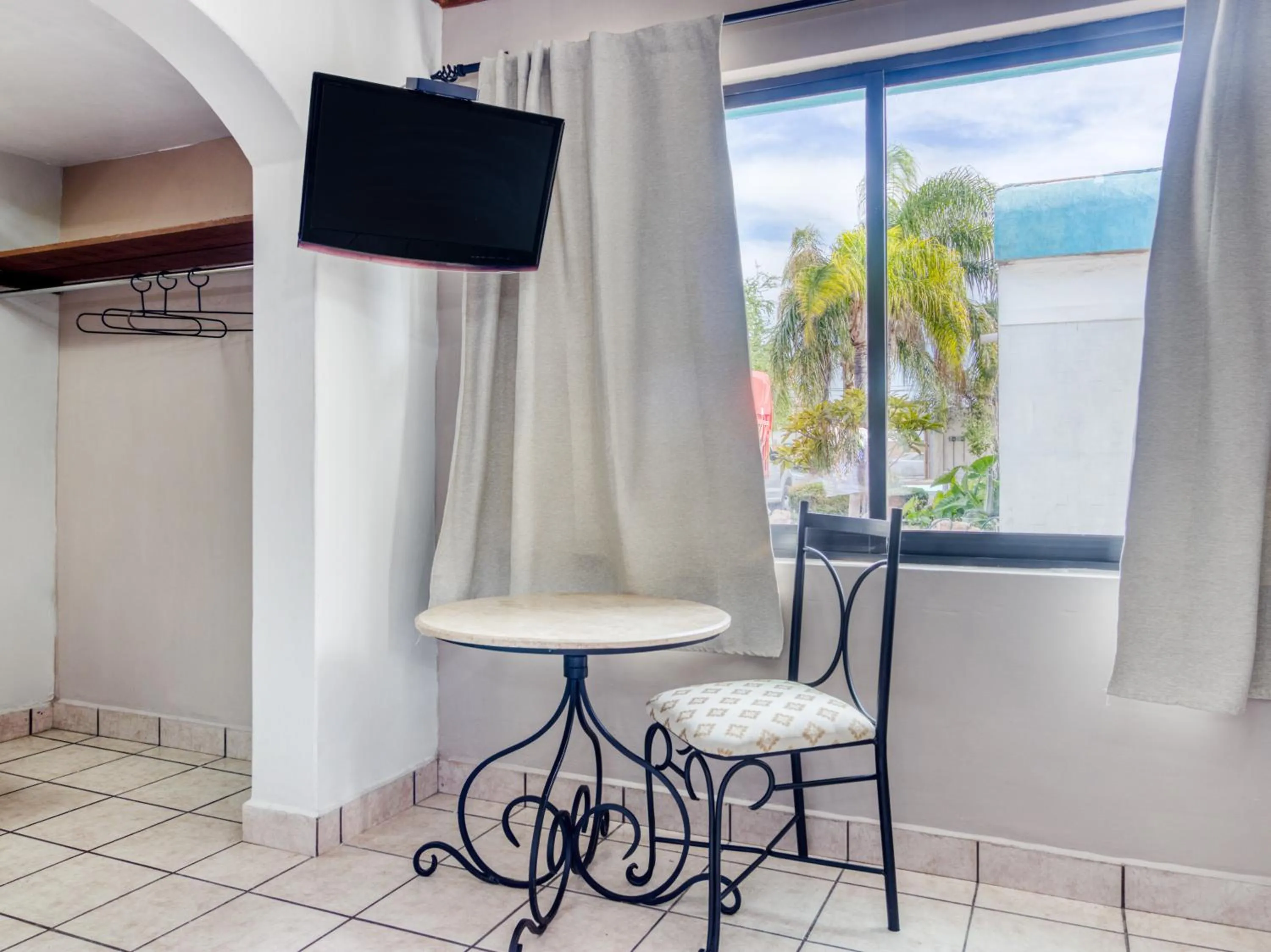 Bedroom in Capital O Hotel La Siesta, Gomez Palacio