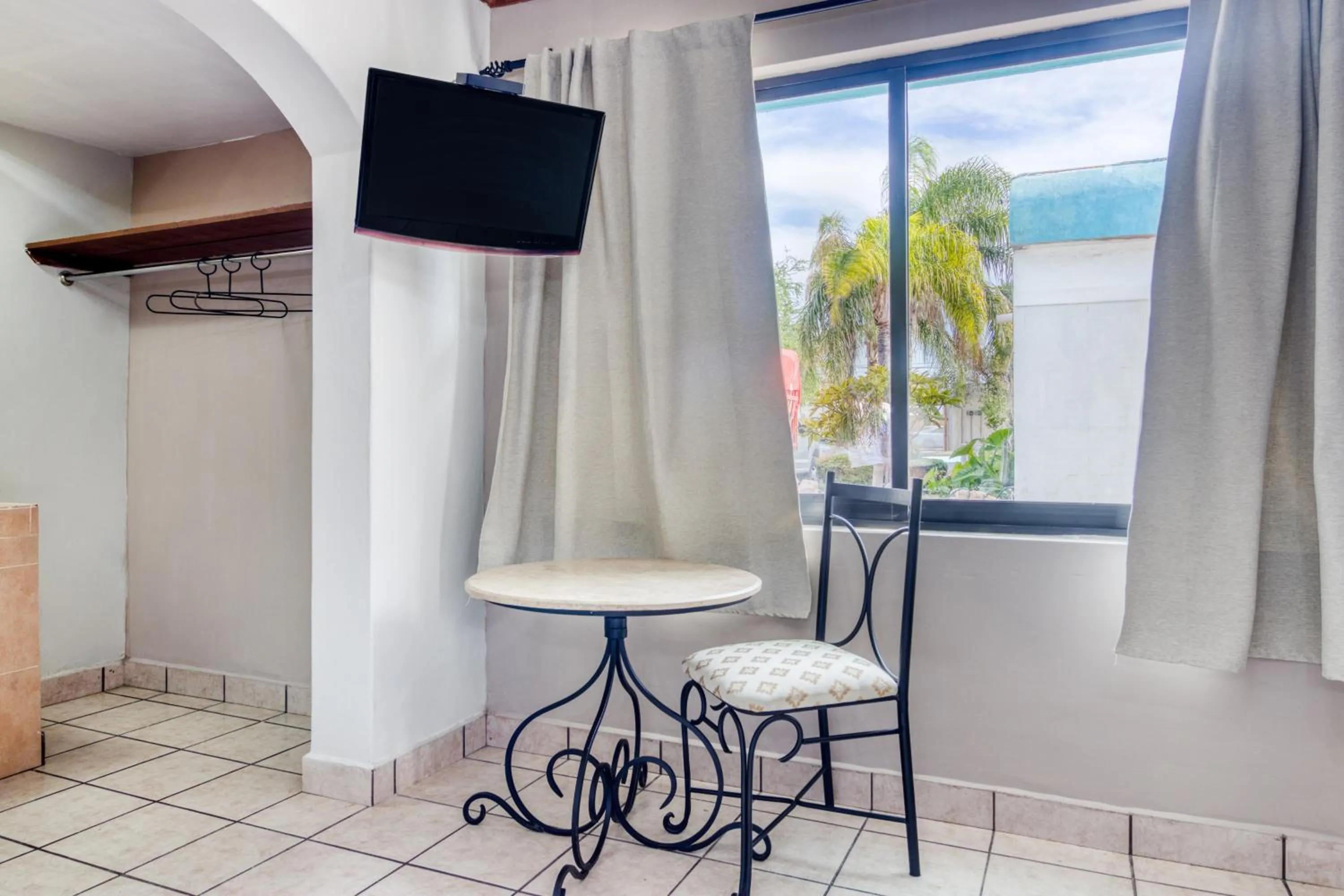 Bedroom in Capital O Hotel La Siesta, Gomez Palacio