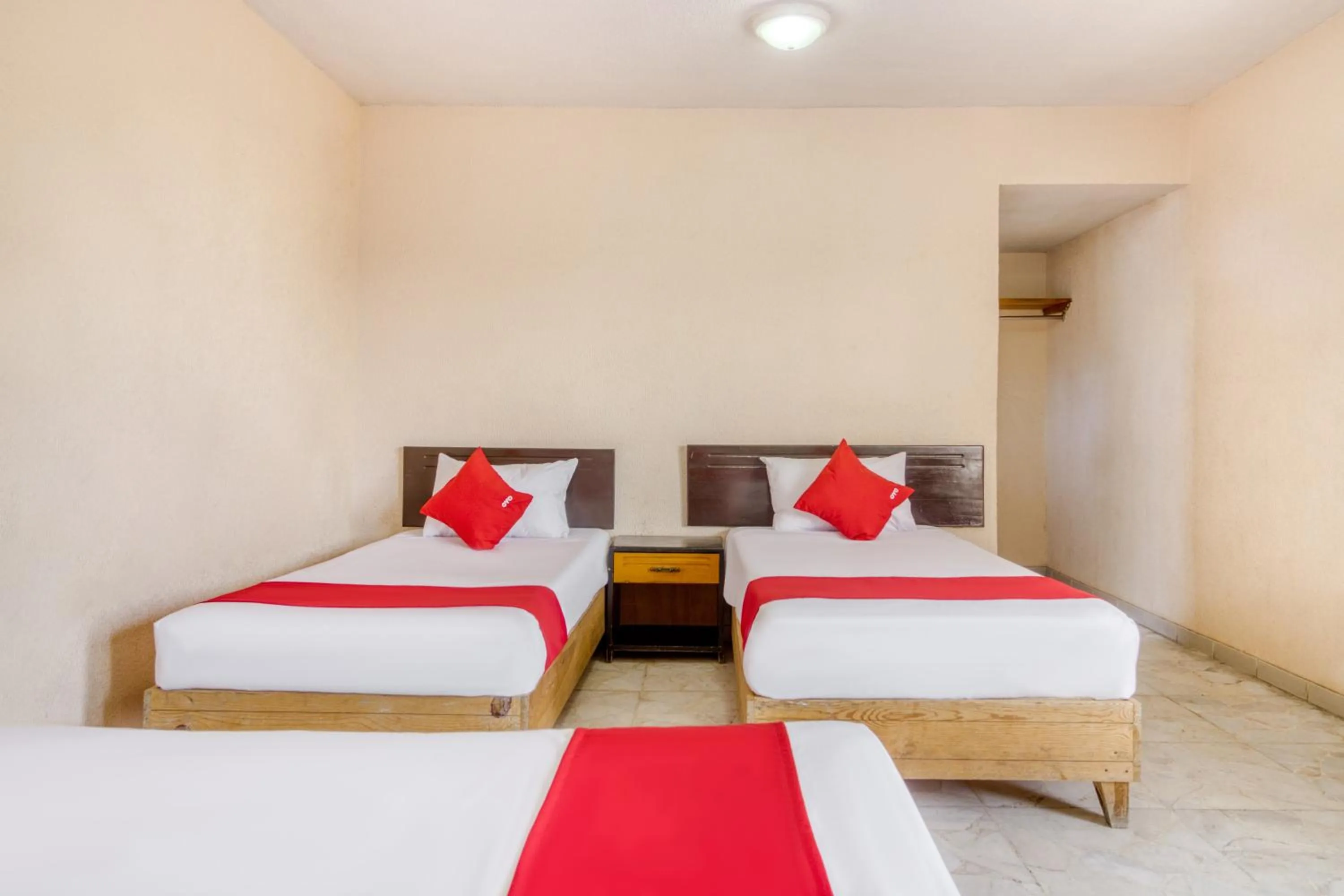 Bedroom in Capital O Hotel La Siesta, Gomez Palacio