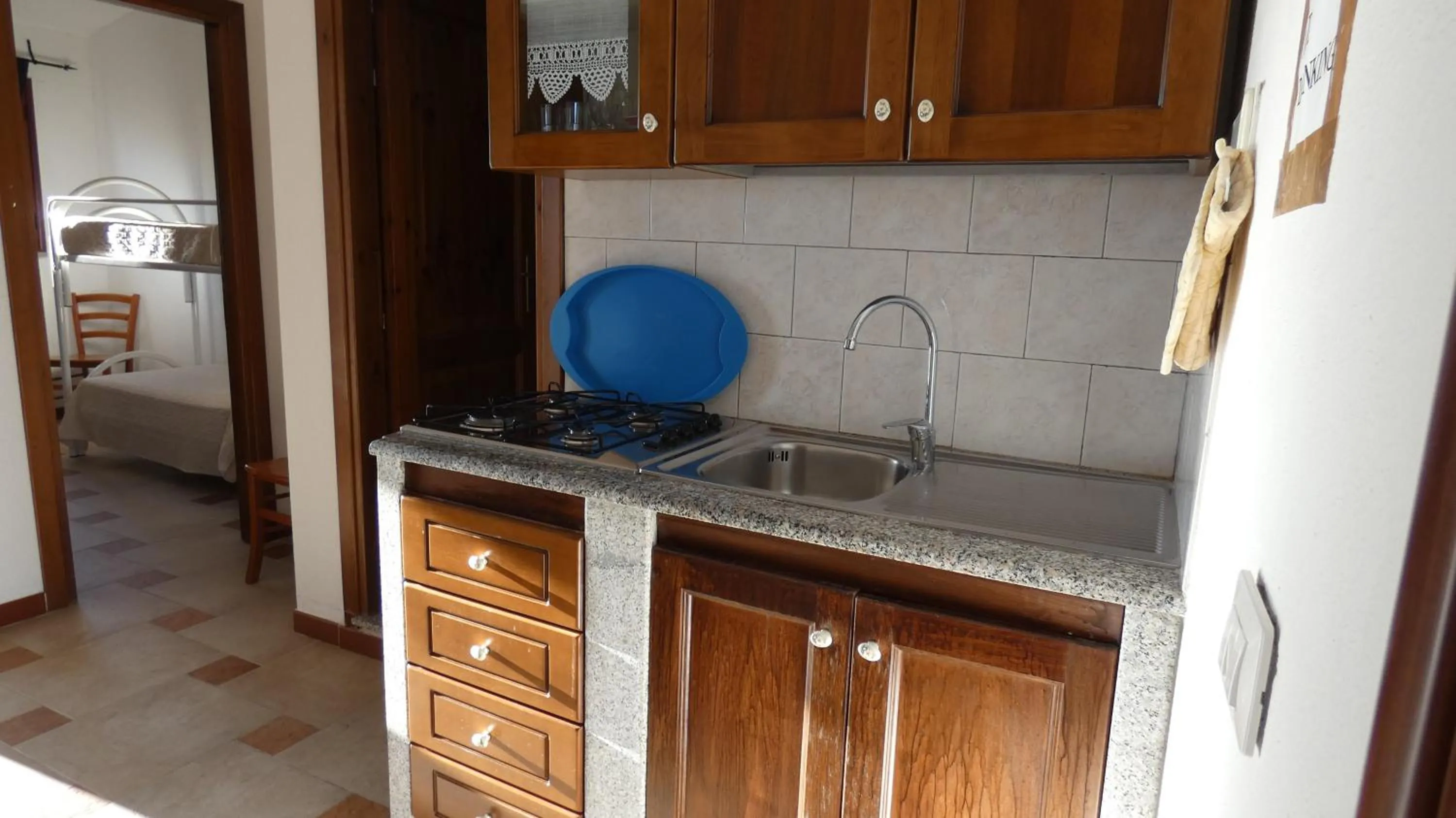 Kitchen or kitchenette in Comino Alto Agriturismo e Appartamenti