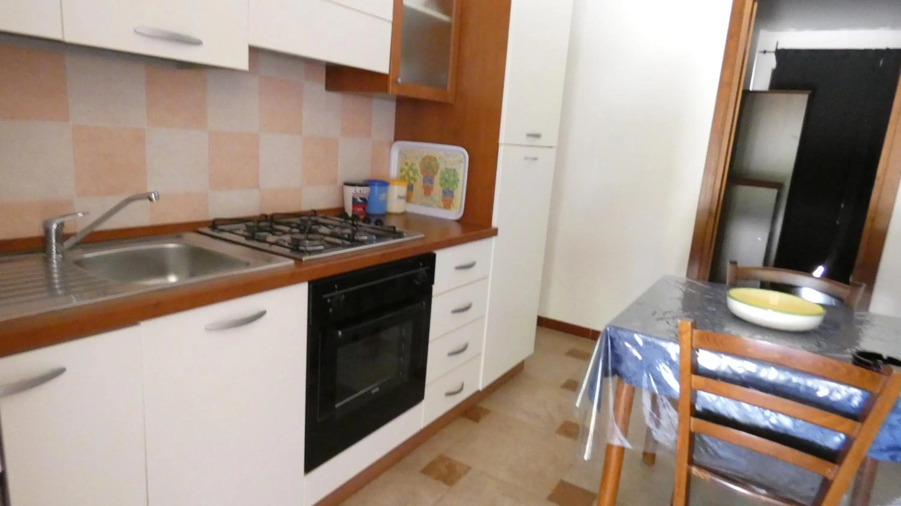 Kitchen or kitchenette in Comino Alto Agriturismo e Appartamenti
