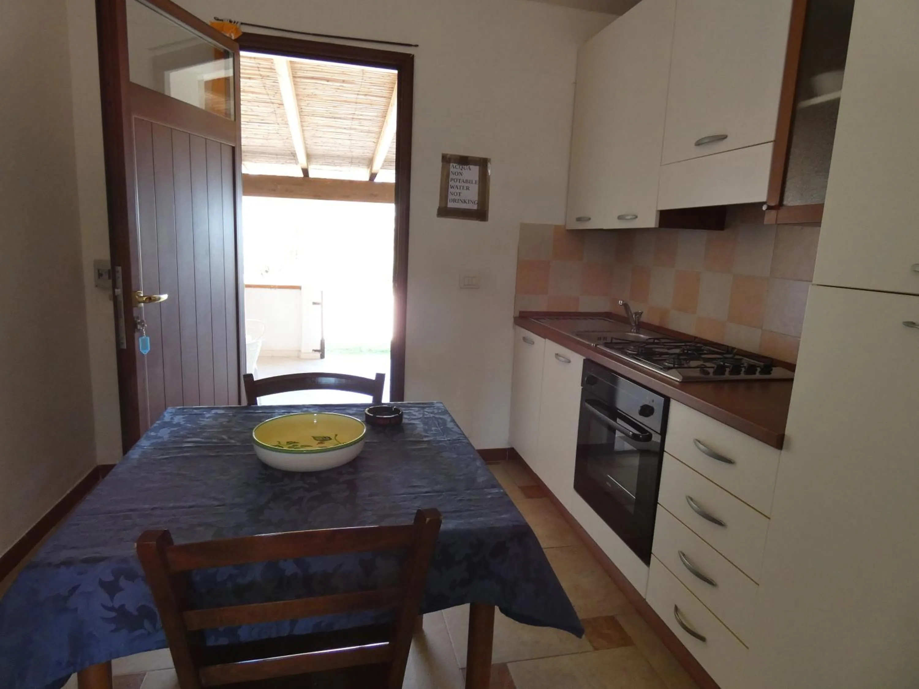 Kitchen or kitchenette in Comino Alto Agriturismo e Appartamenti