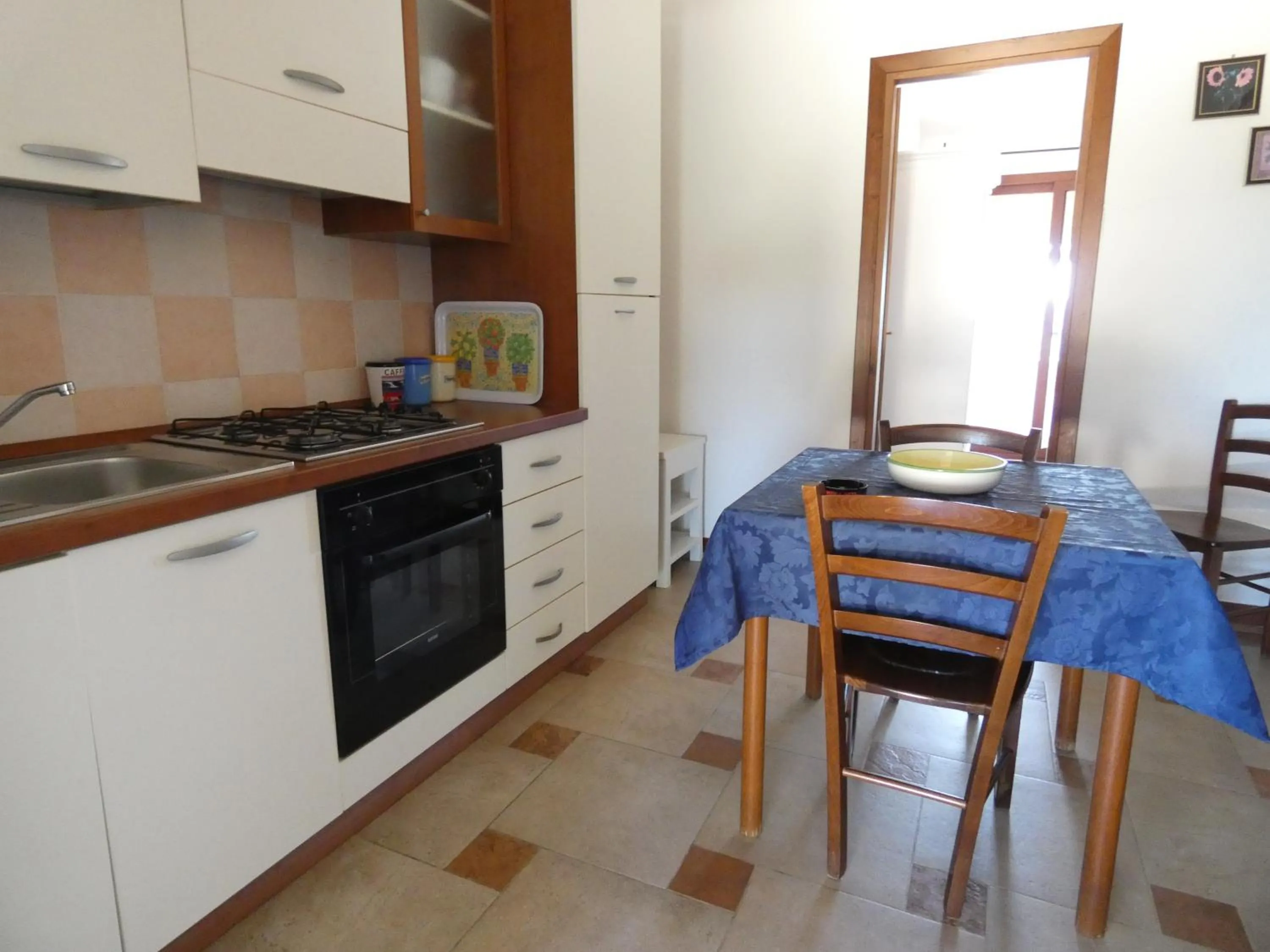 Kitchen or kitchenette in Comino Alto Agriturismo e Appartamenti