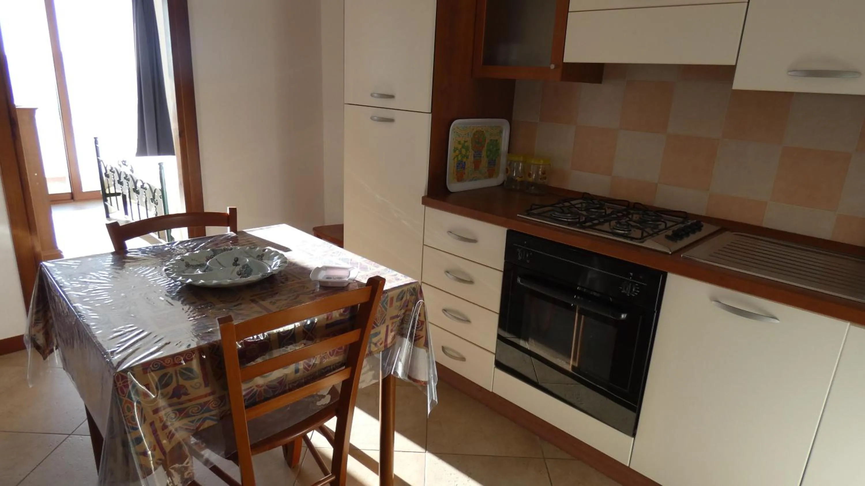 Kitchen or kitchenette in Comino Alto Agriturismo e Appartamenti