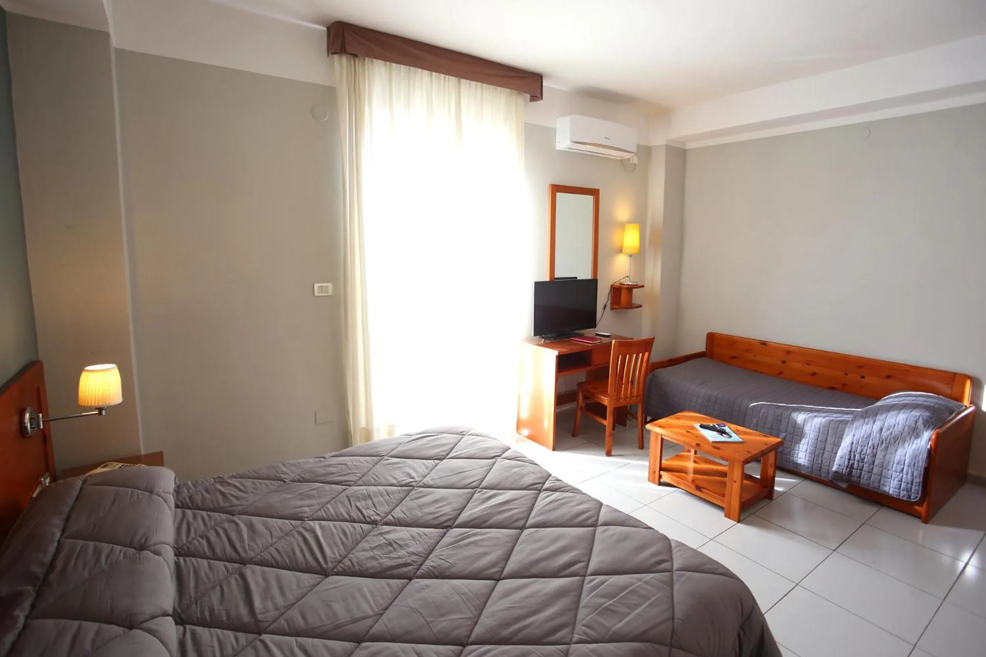 Bed in Albergo Del Pino