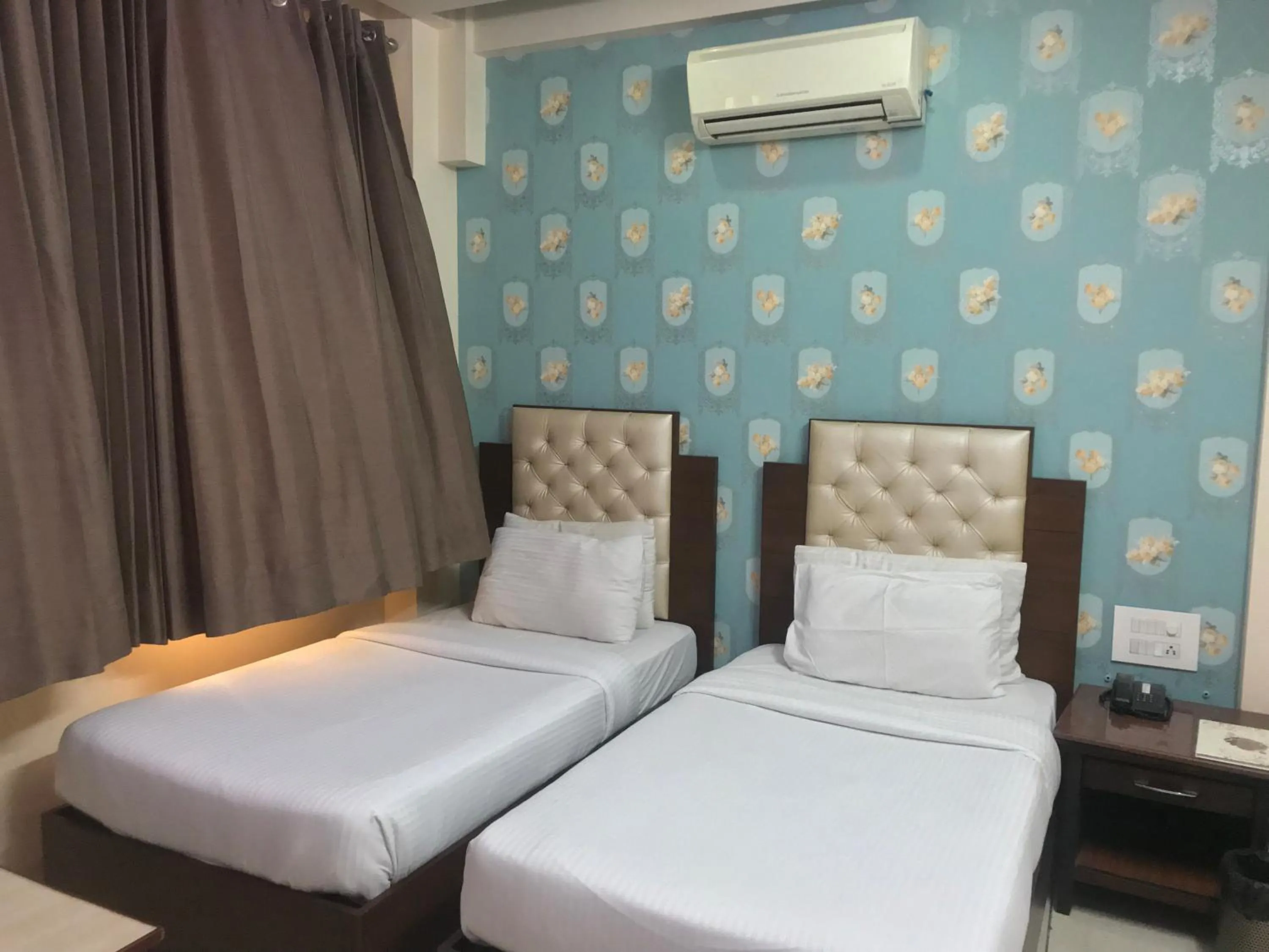 Bedroom, Bed in Leela Residency