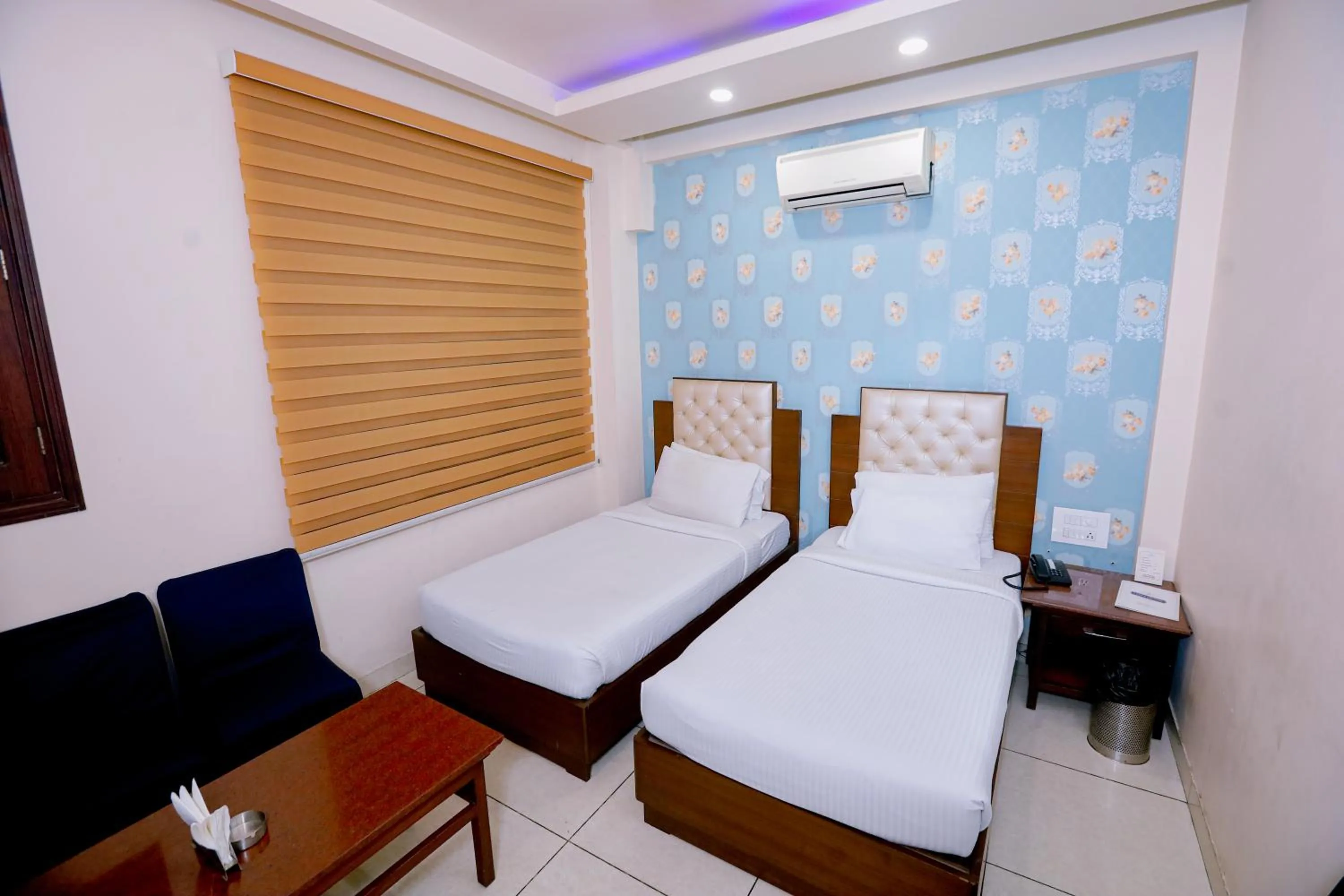 Bedroom, Bed in Leela Residency