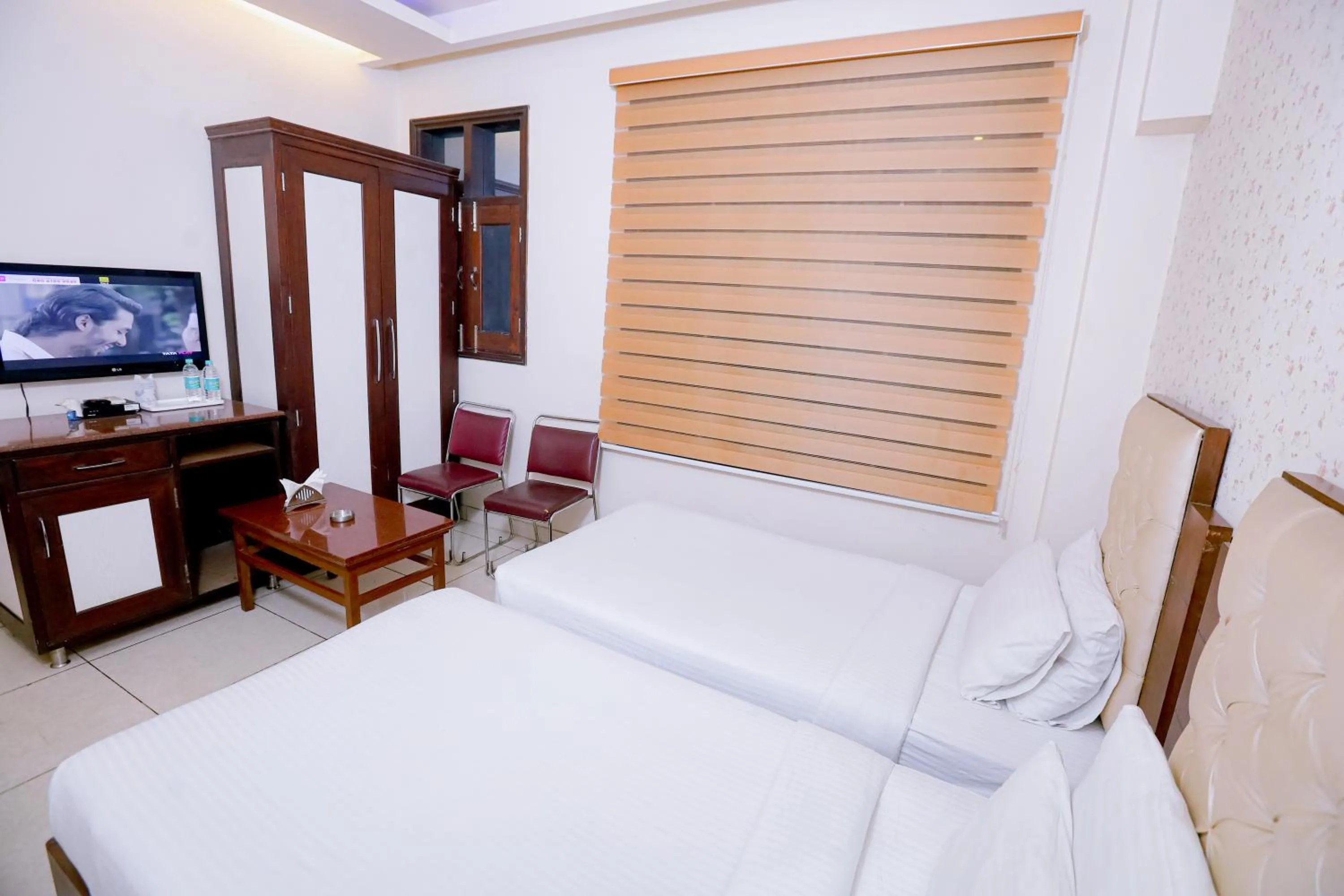 Bedroom, Bed in Leela Residency