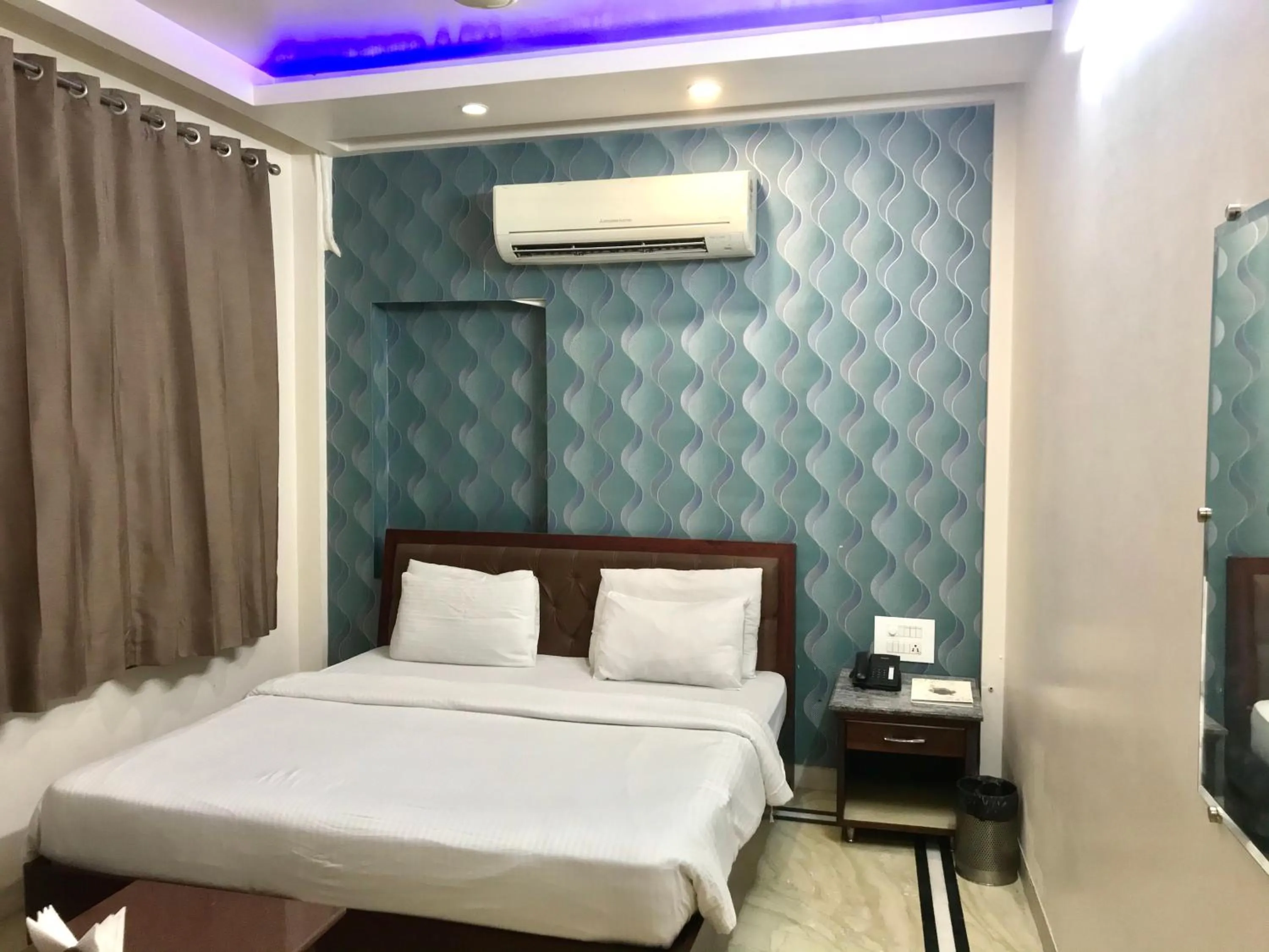 Bedroom, Bed in Leela Residency