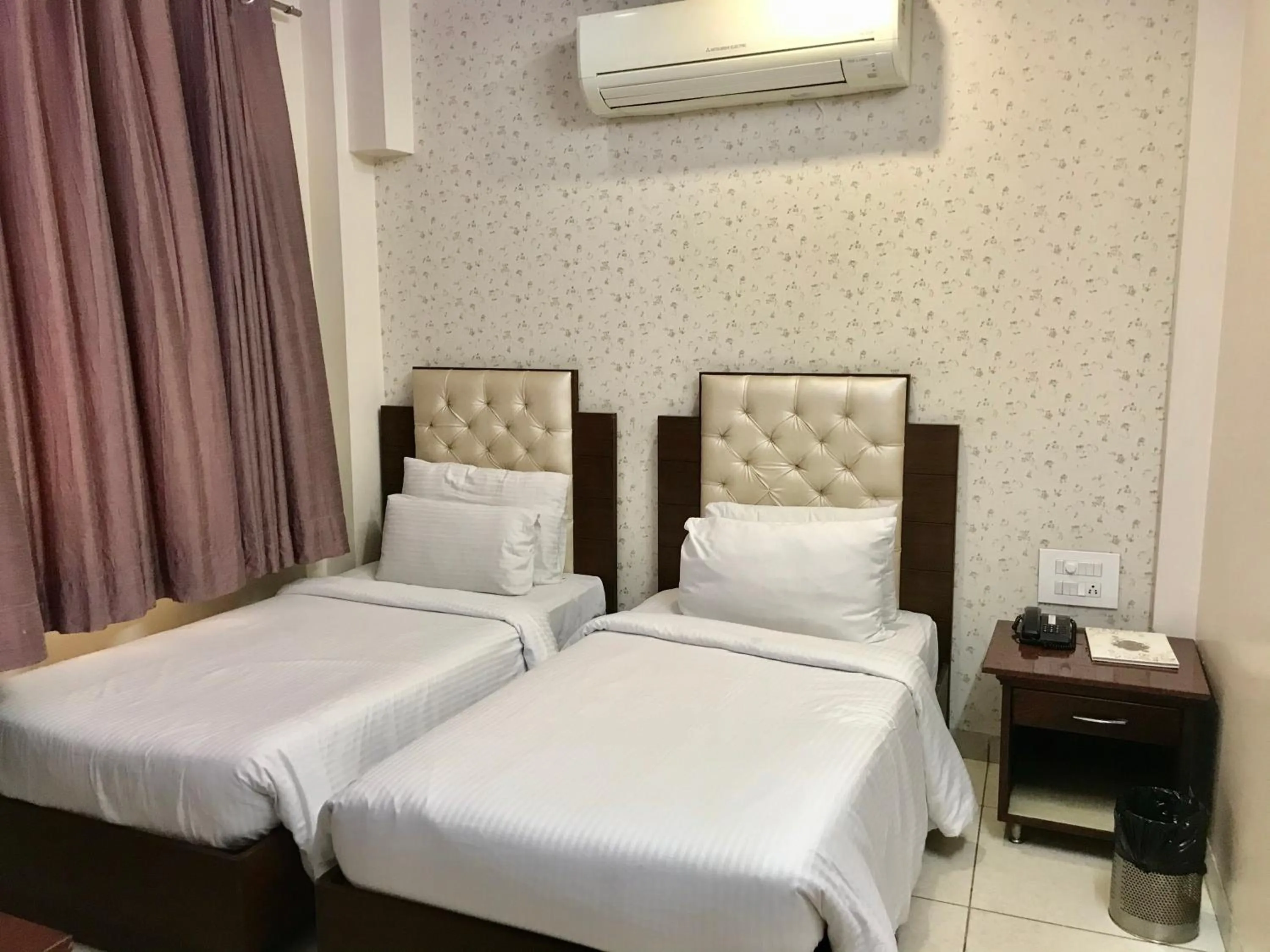 Bedroom, Bed in Leela Residency