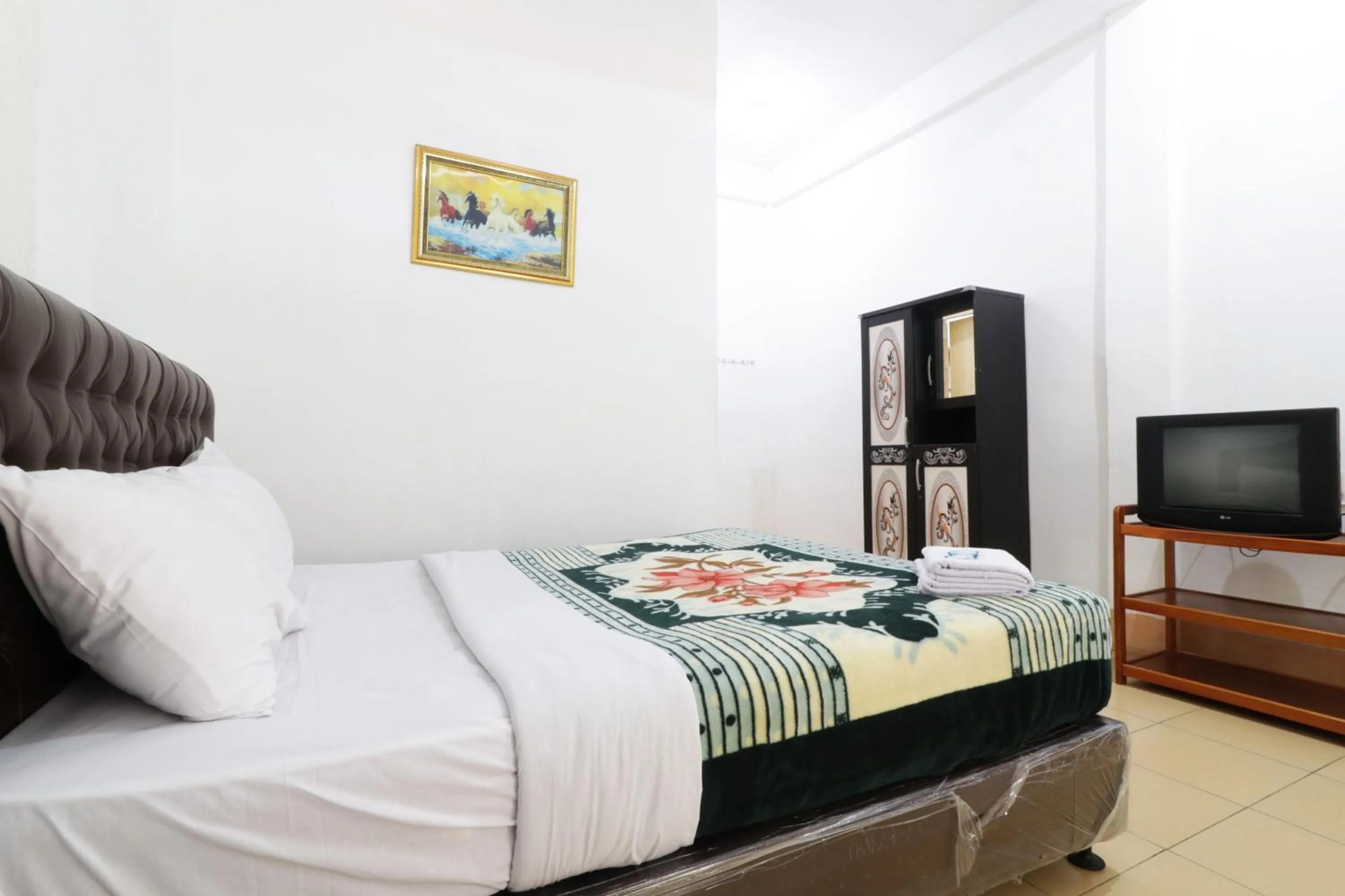 Bed in Villa Keluarga Bre Batunanggar