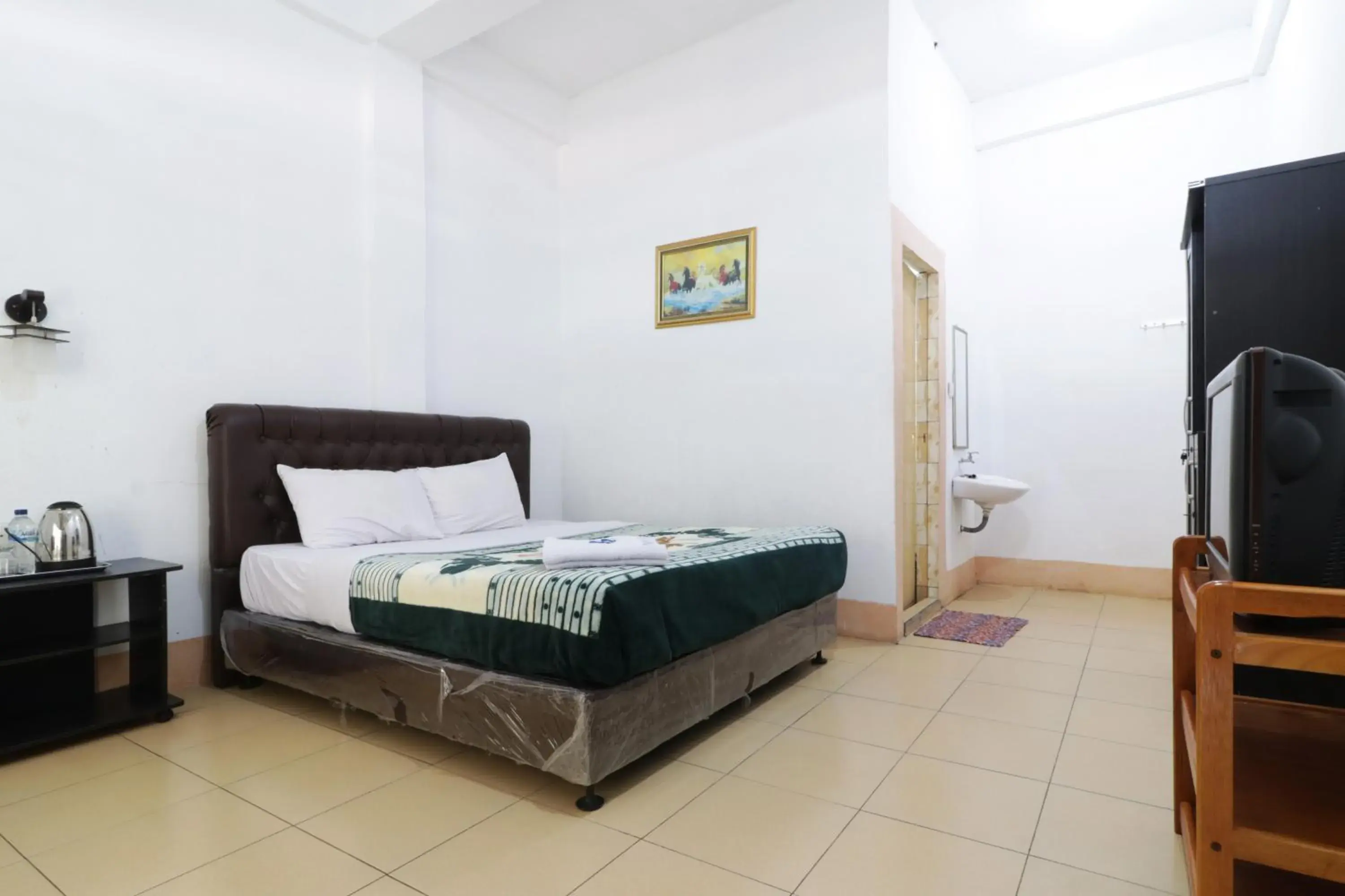 Bed in Villa Keluarga Bre Batunanggar Bed in Villa Keluarga Bre Batunanggar