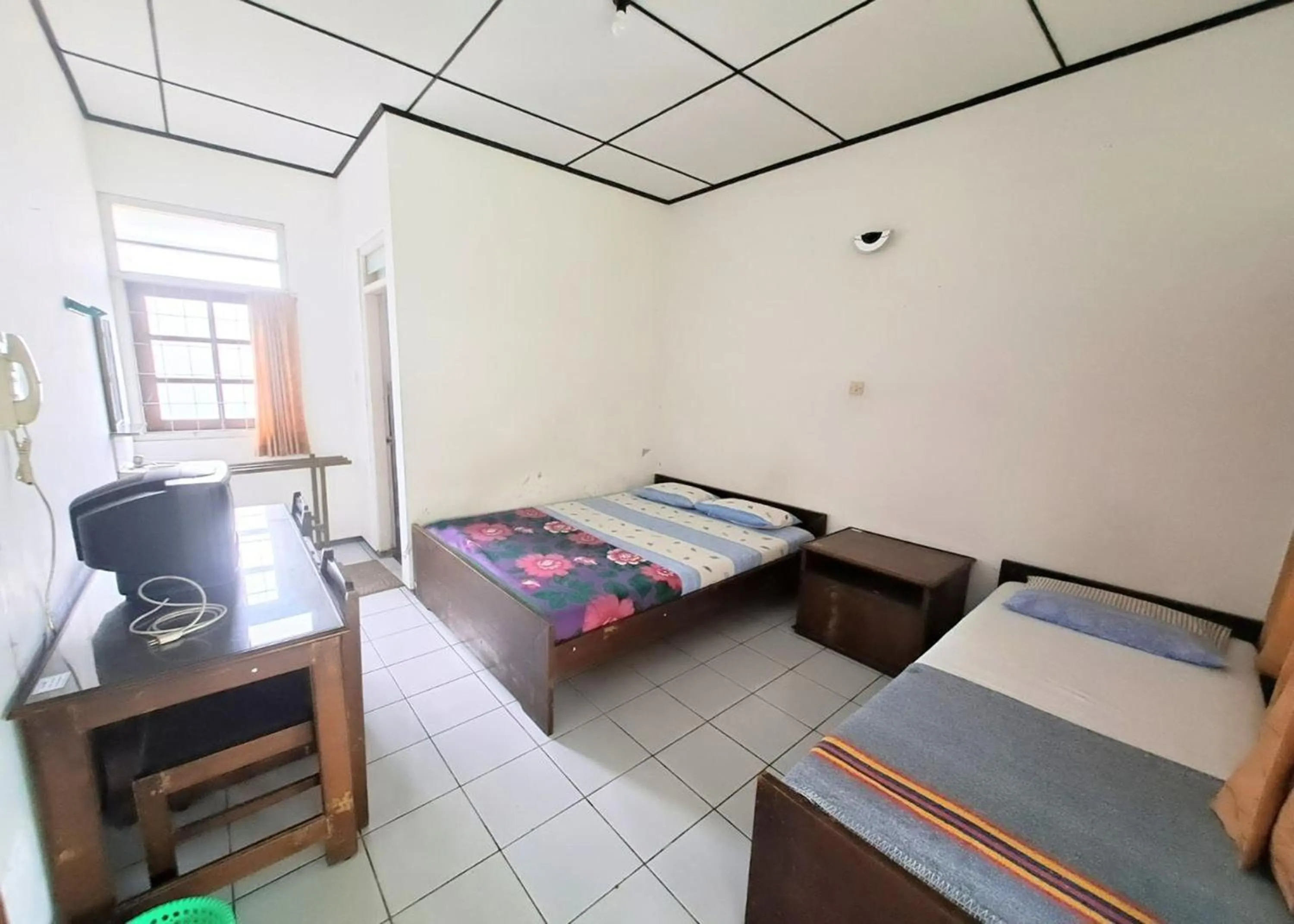 Bed in Satriafi Hotel