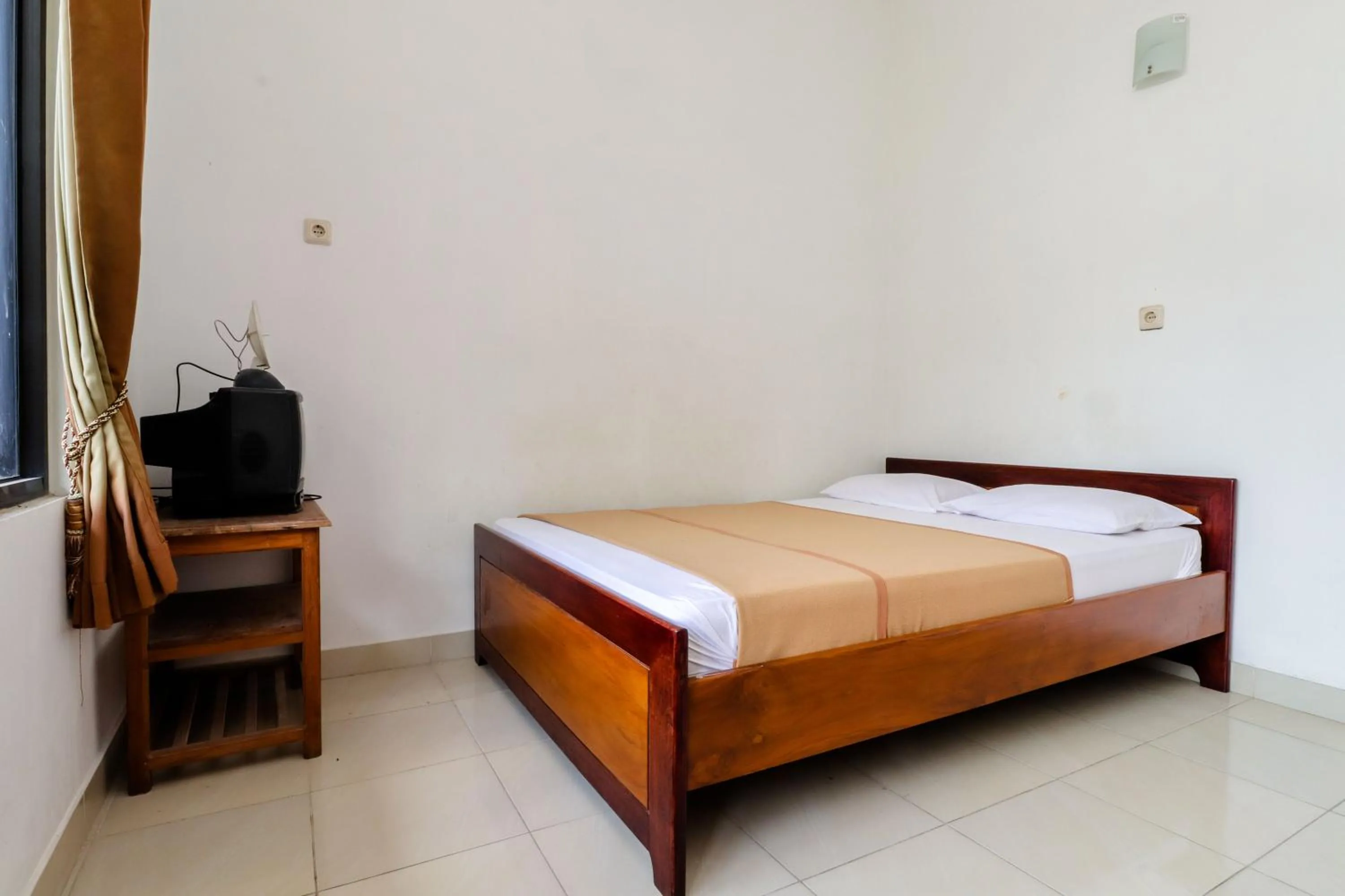 Bed in Hotel Wismancala Kaliurang