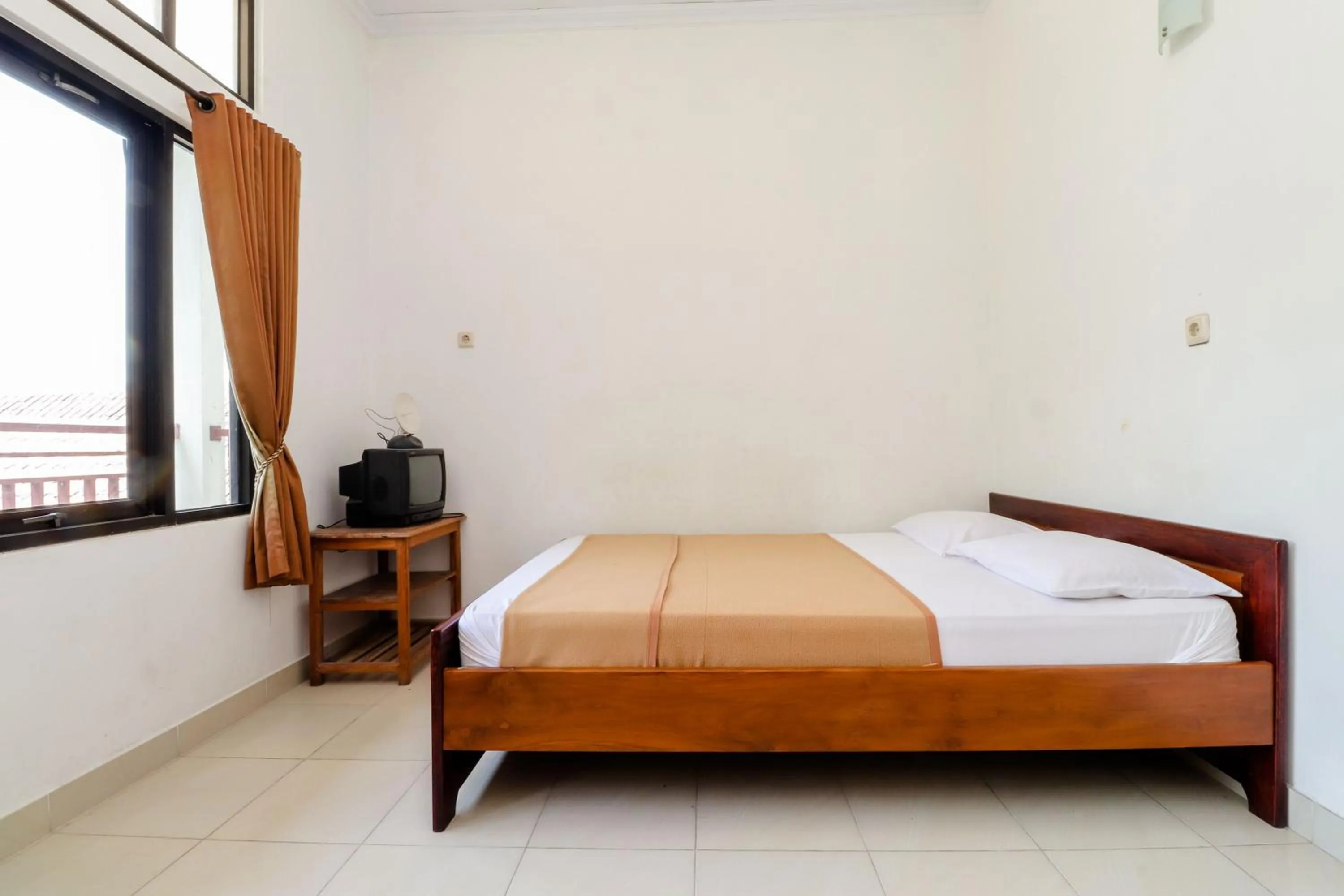 Bed in Hotel Wismancala Kaliurang