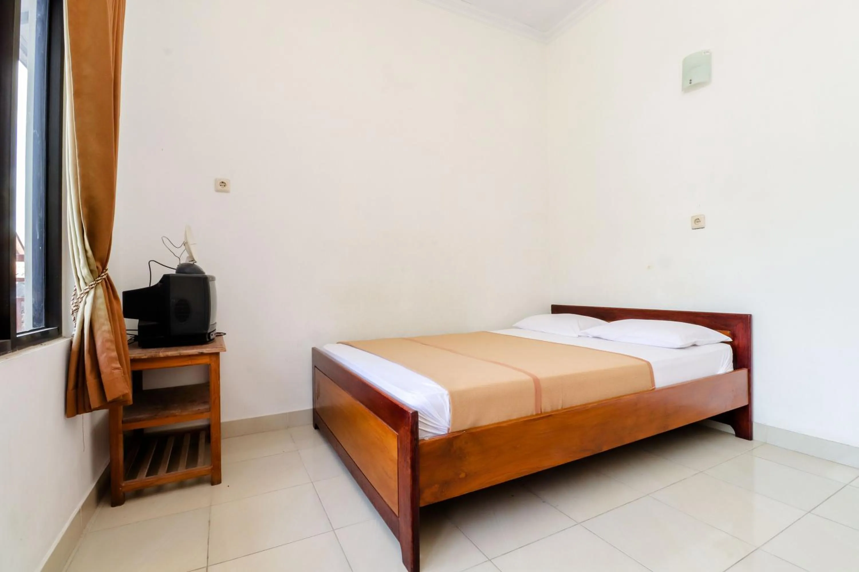 Bed in Hotel Wismancala Kaliurang