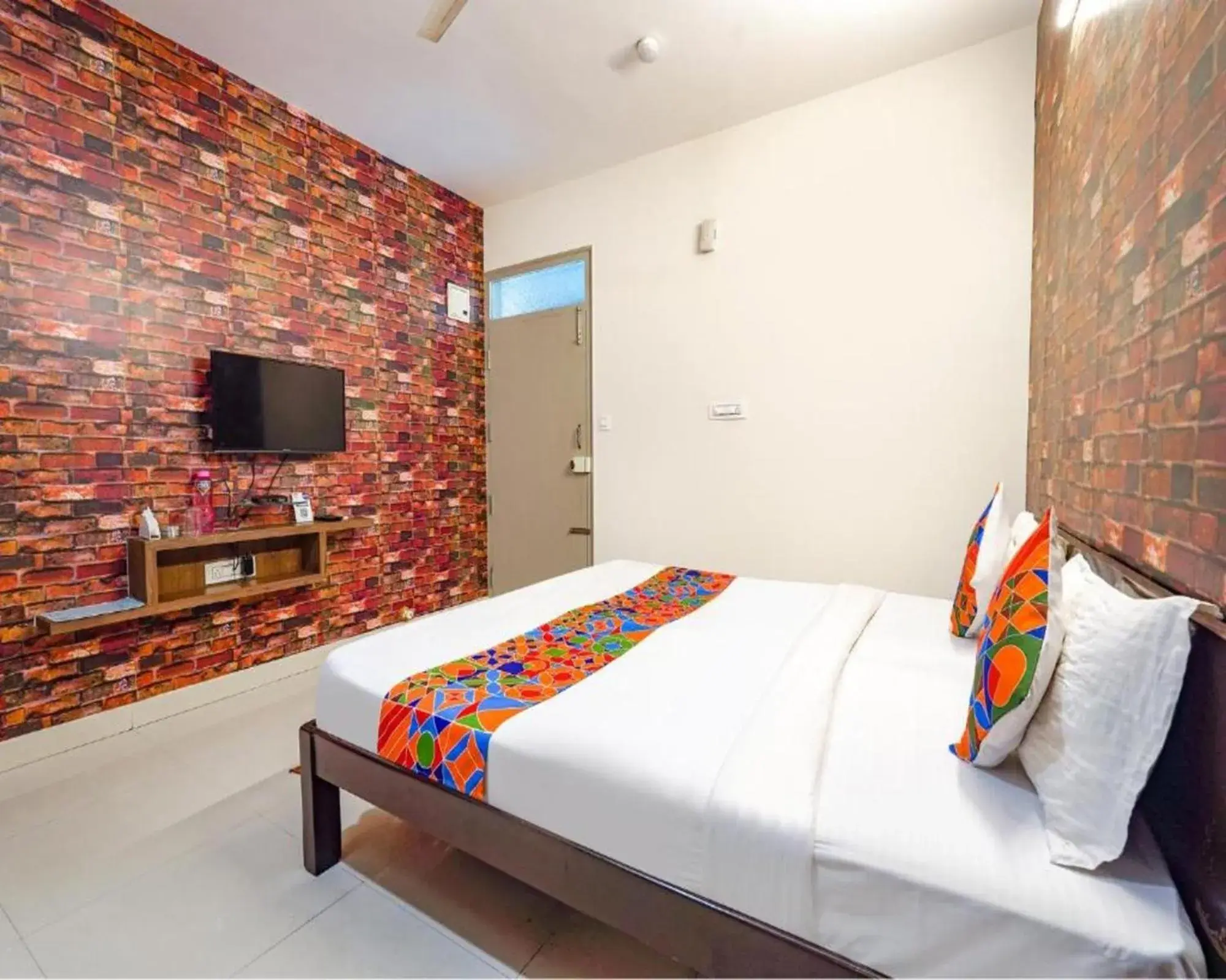 Bed in FabExpress Kings Suites HRBR Layout - Nr Manyata Tech Park Bed in FabExpress Kings Suites HRBR Layout - Nr Manyata Tech Park