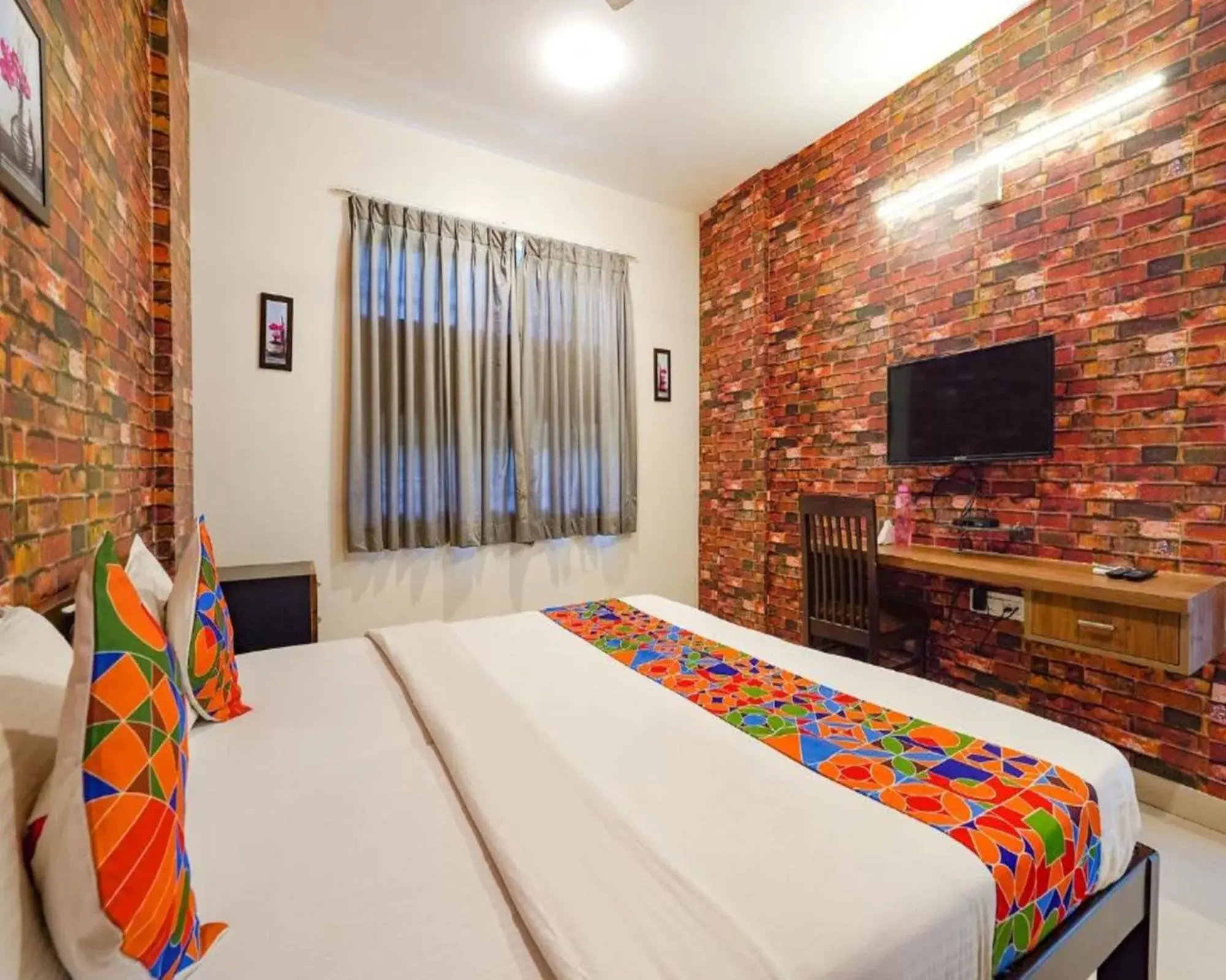 Bed in FabExpress Kings Suites HRBR Layout - Nr Manyata Tech Park Bed in FabExpress Kings Suites HRBR Layout - Nr Manyata Tech Park