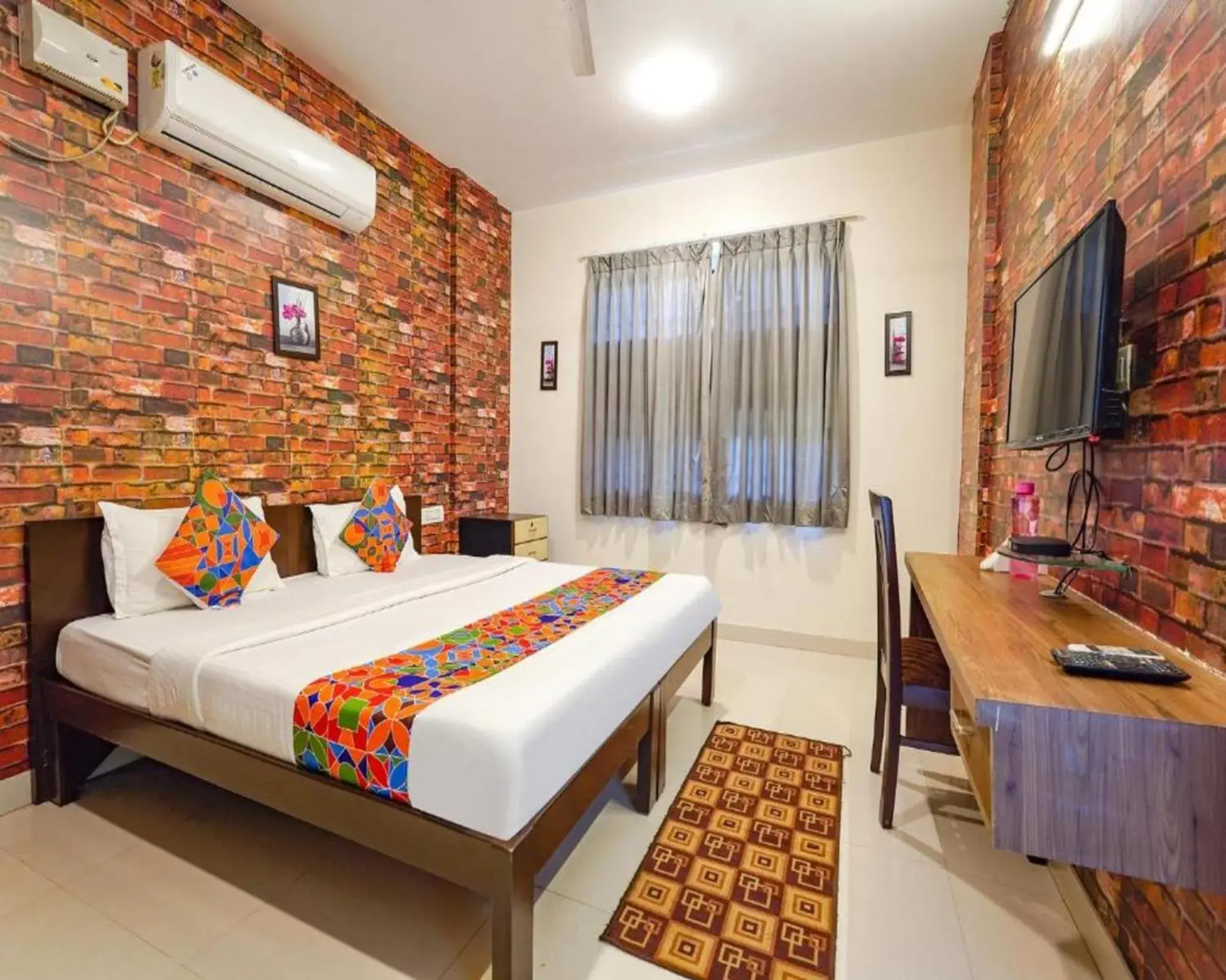 Bed in FabExpress Kings Suites HRBR Layout - Nr Manyata Tech Park Bed in FabExpress Kings Suites HRBR Layout - Nr Manyata Tech Park