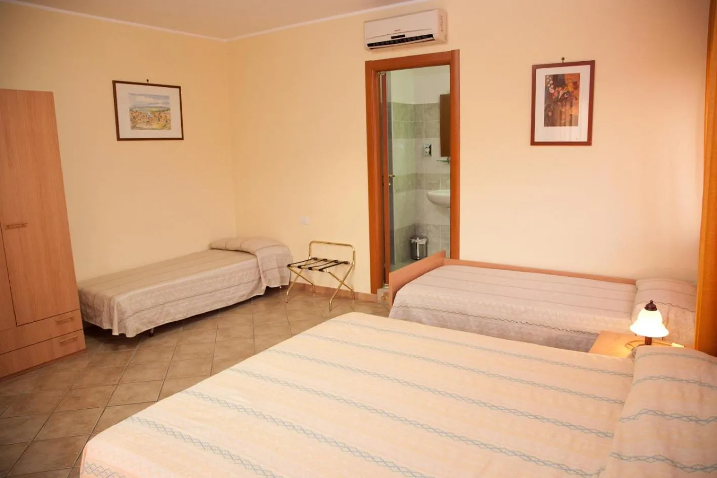 Bed in Caffè Nuovo 2 Holiday Rooms