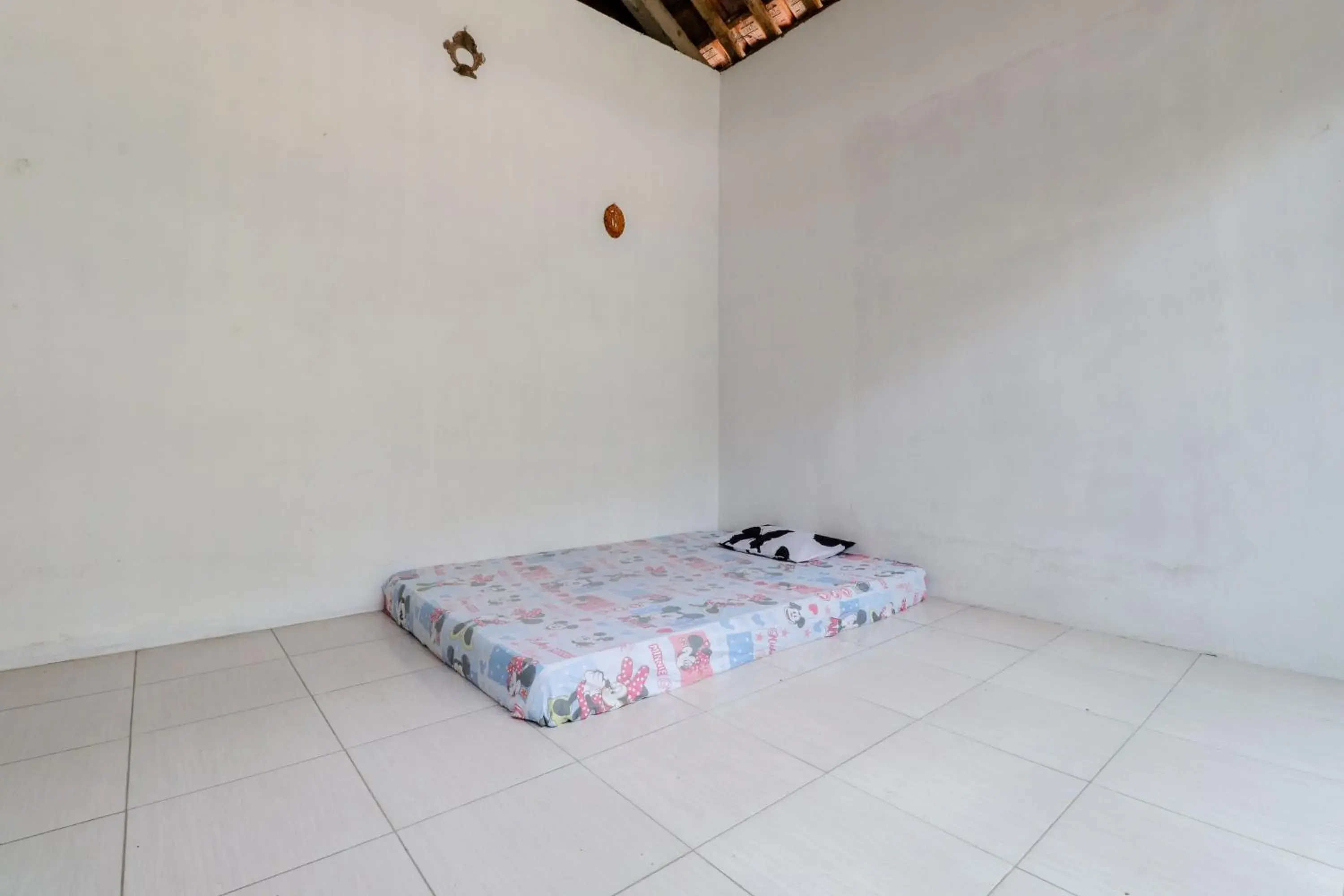Standard Double Room with Fan in Griya Erlangga Homestay Standard Double Room with Fan in Griya Erlangga Homestay