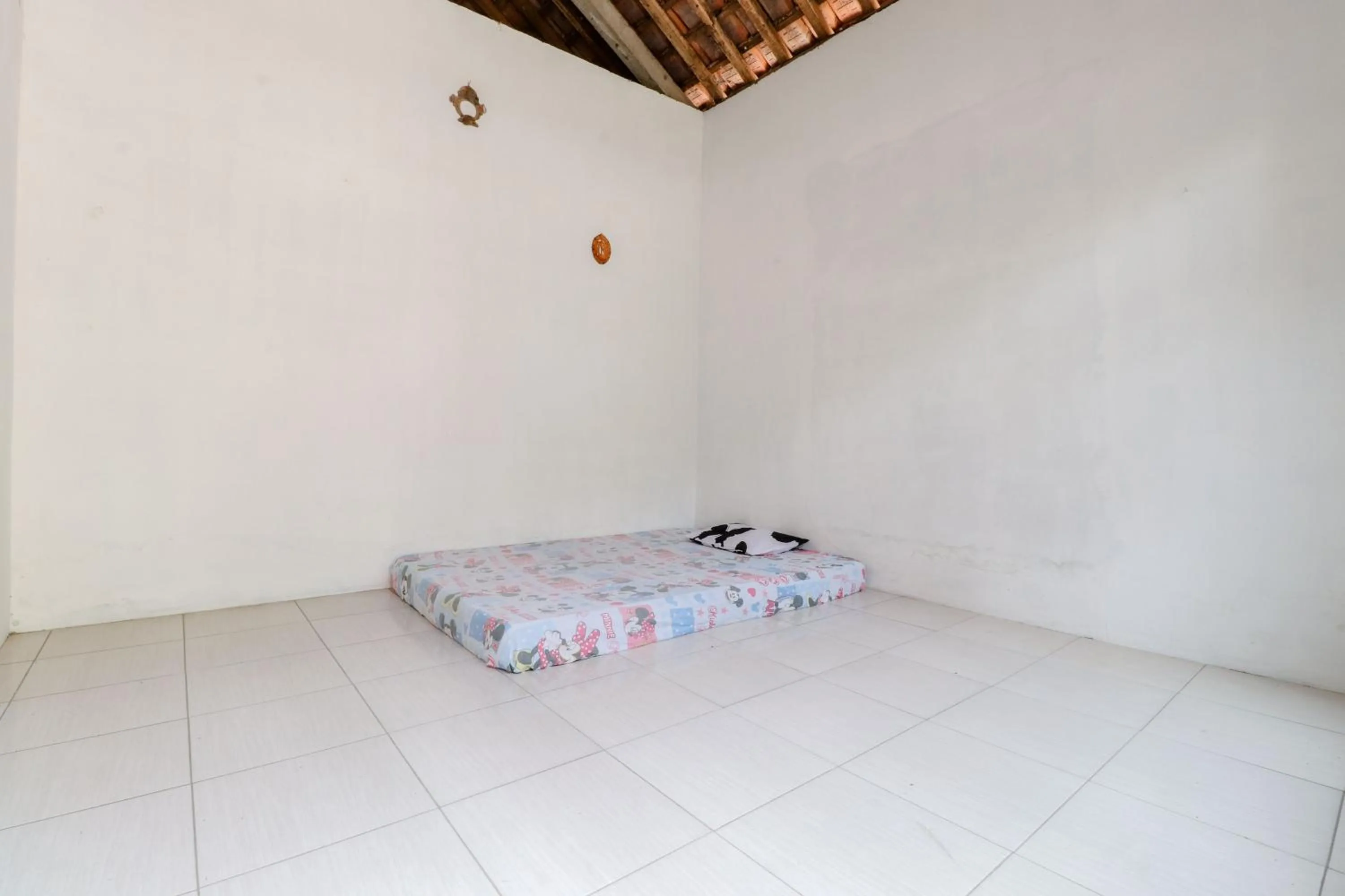 Bed in Griya Erlangga Homestay