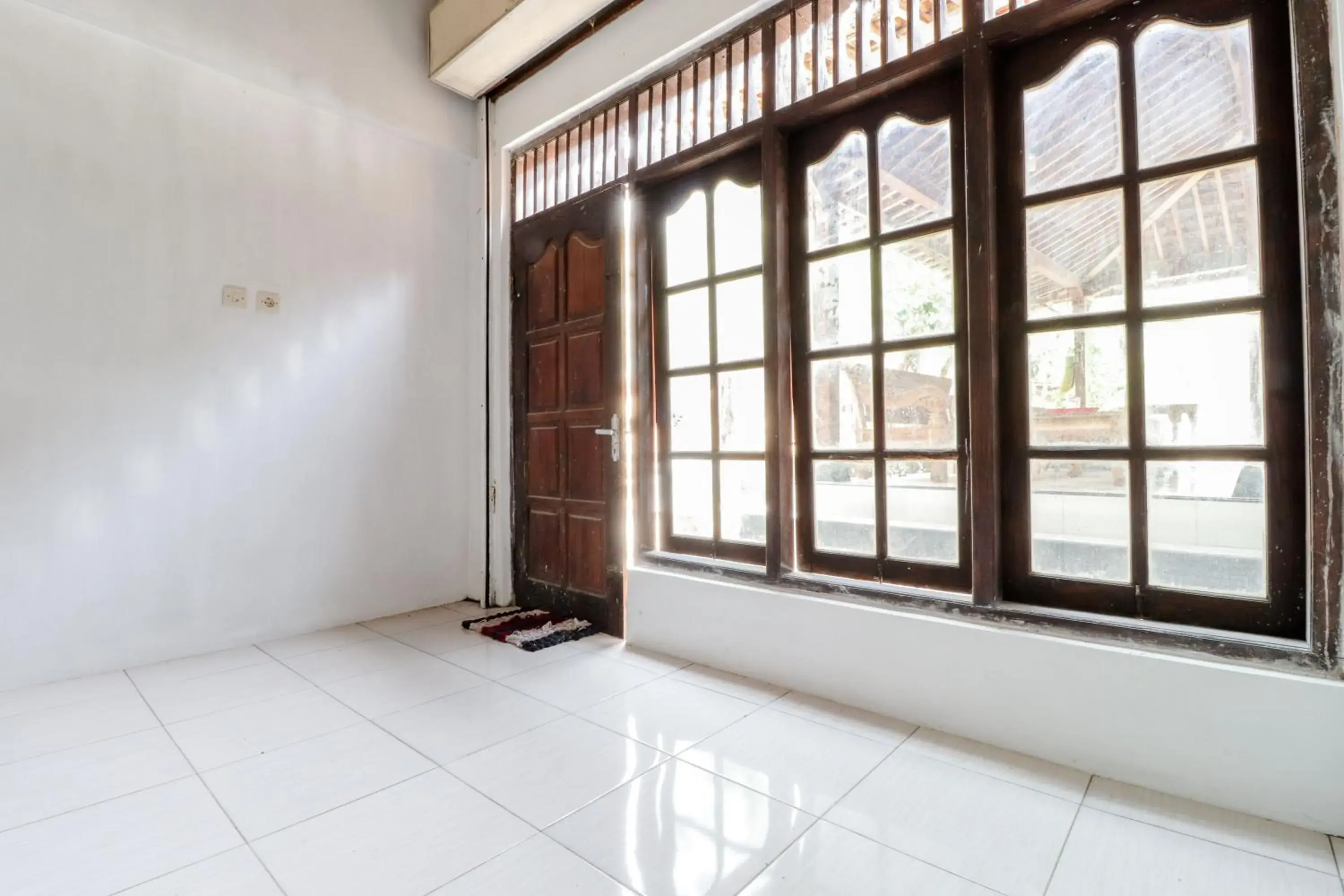Standard Double Room with Fan in Griya Erlangga Homestay Standard Double Room with Fan in Griya Erlangga Homestay
