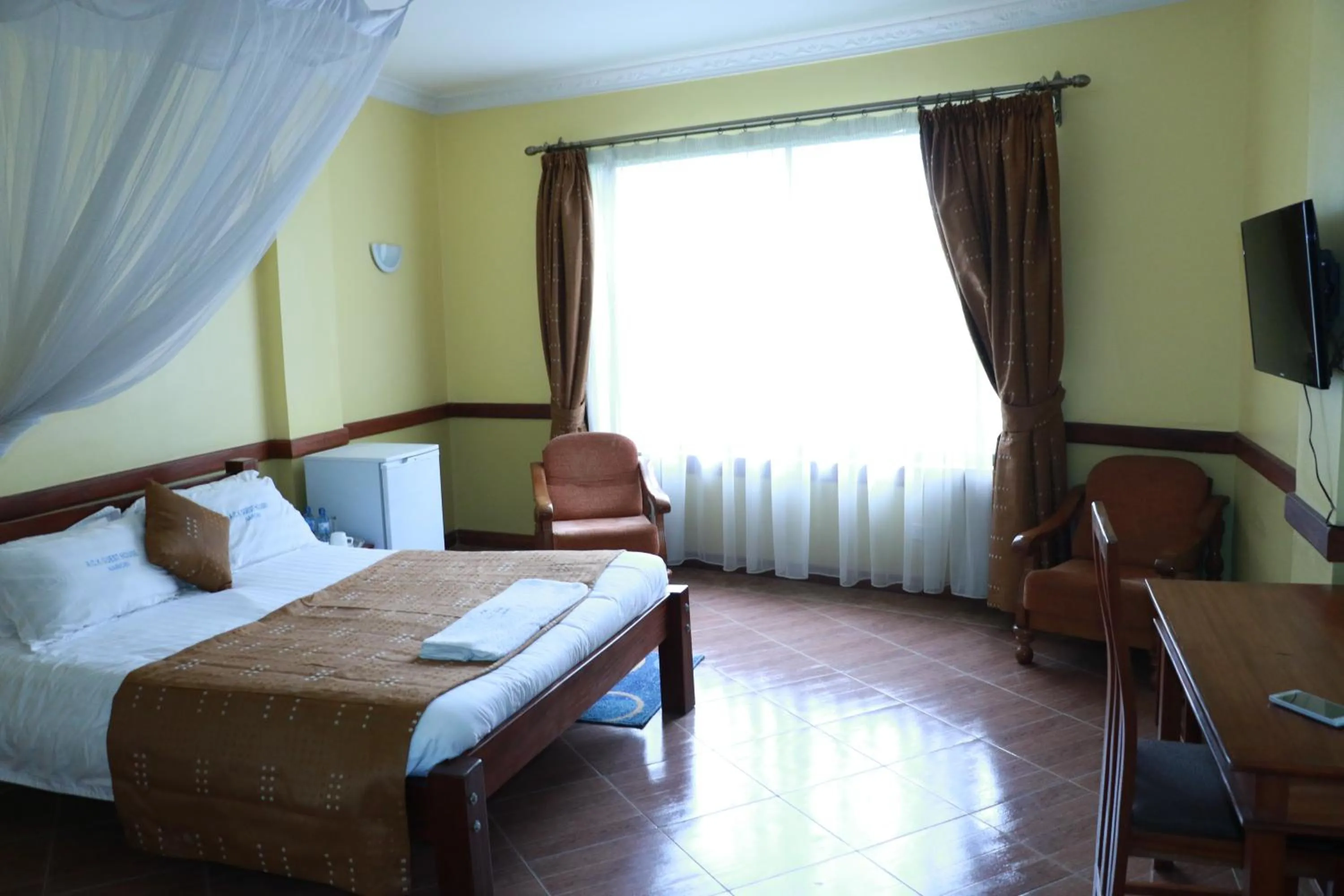 Bed in ACK Guest House Nairobi