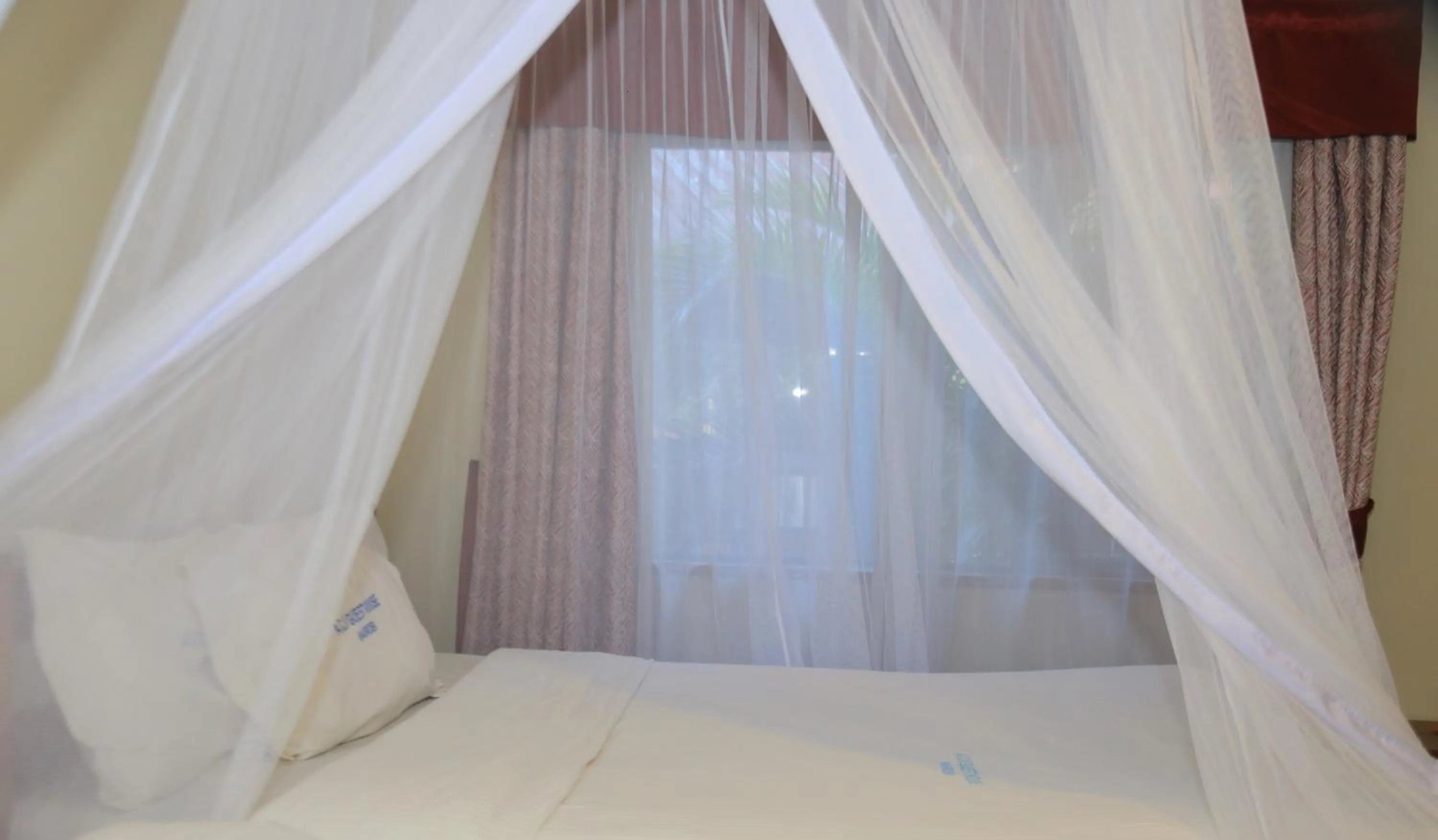 Bed in ACK Guest House Nairobi