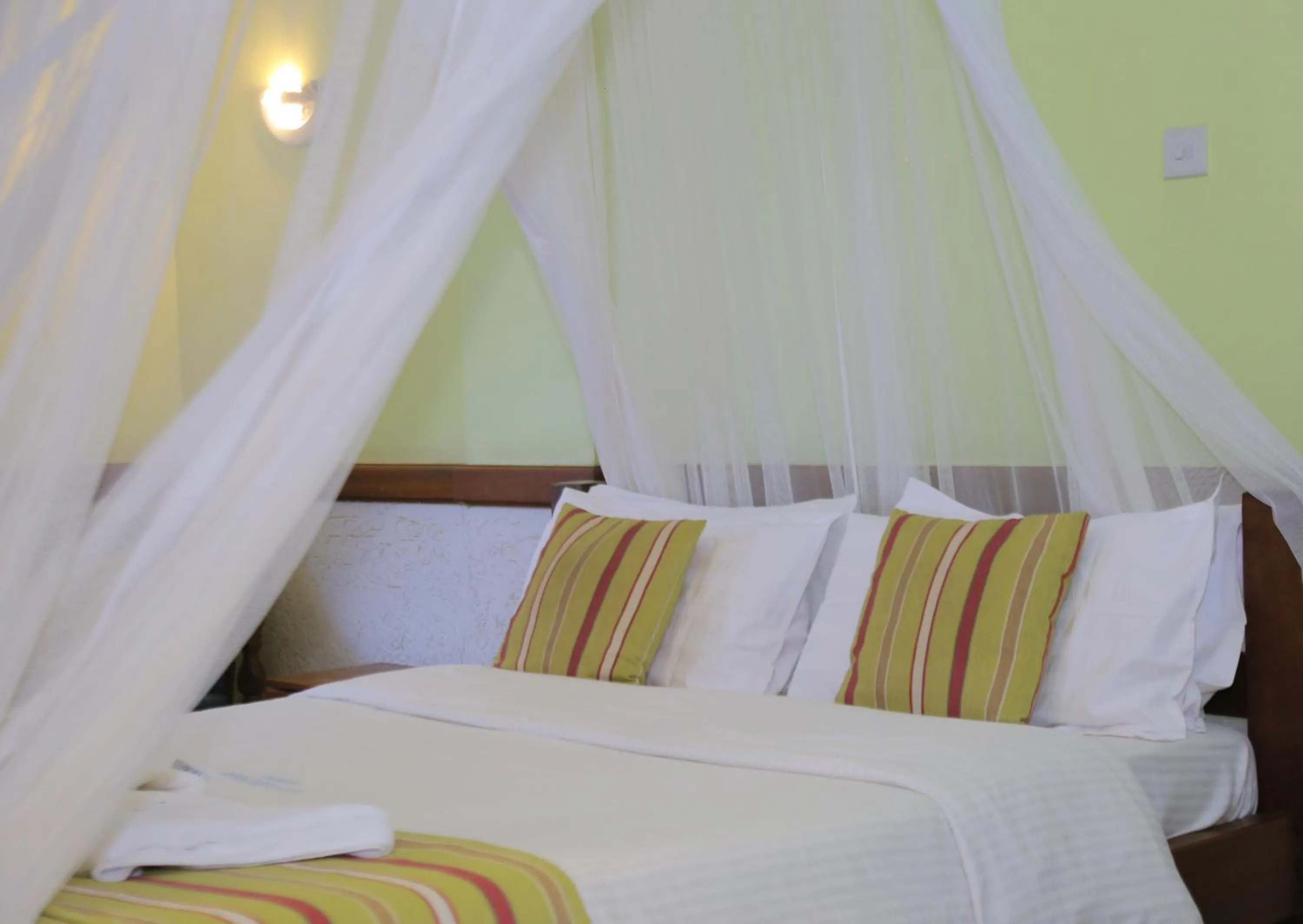 Bed in ACK Guest House Nairobi