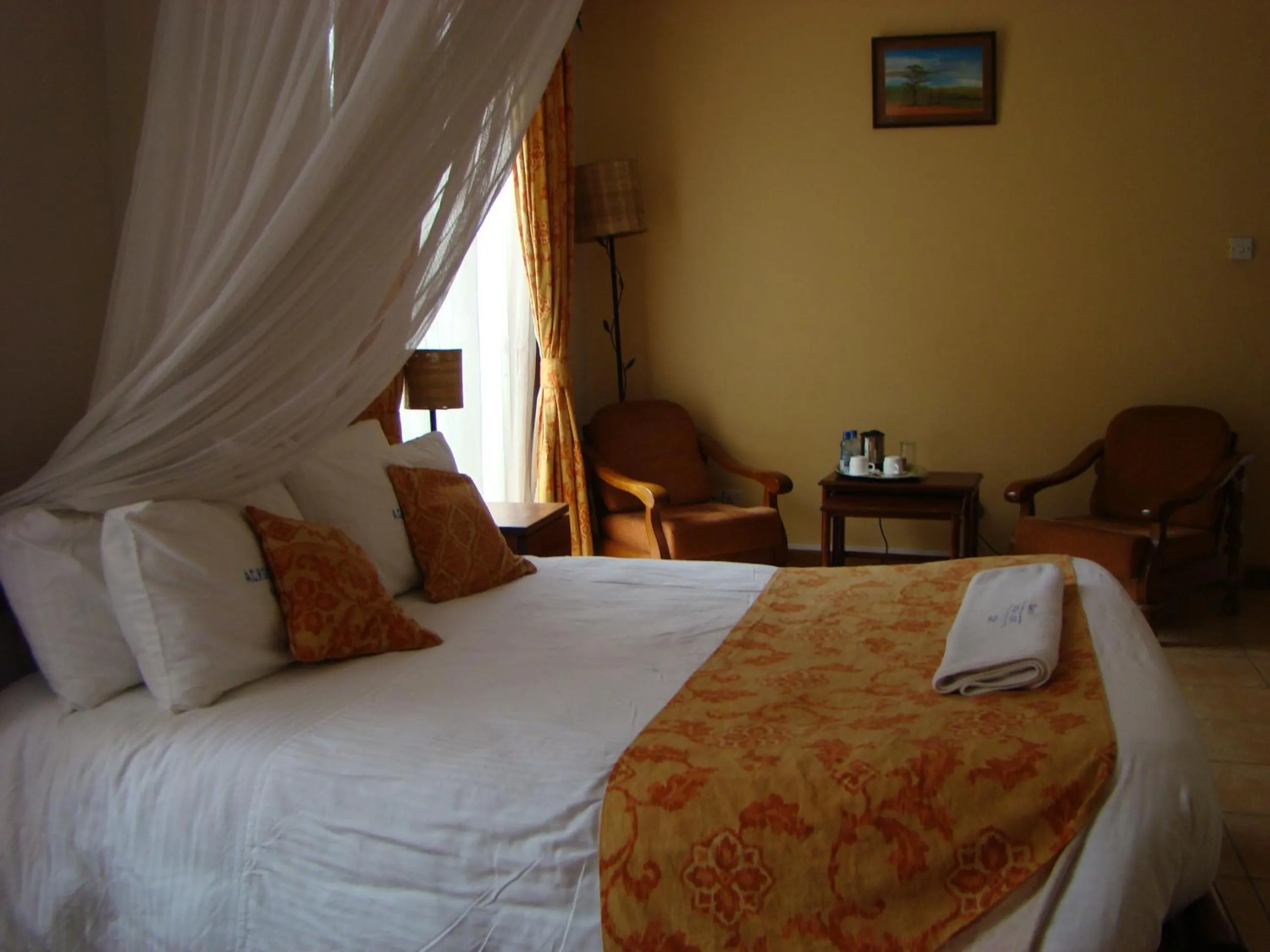 Bed in ACK Guest House Nairobi