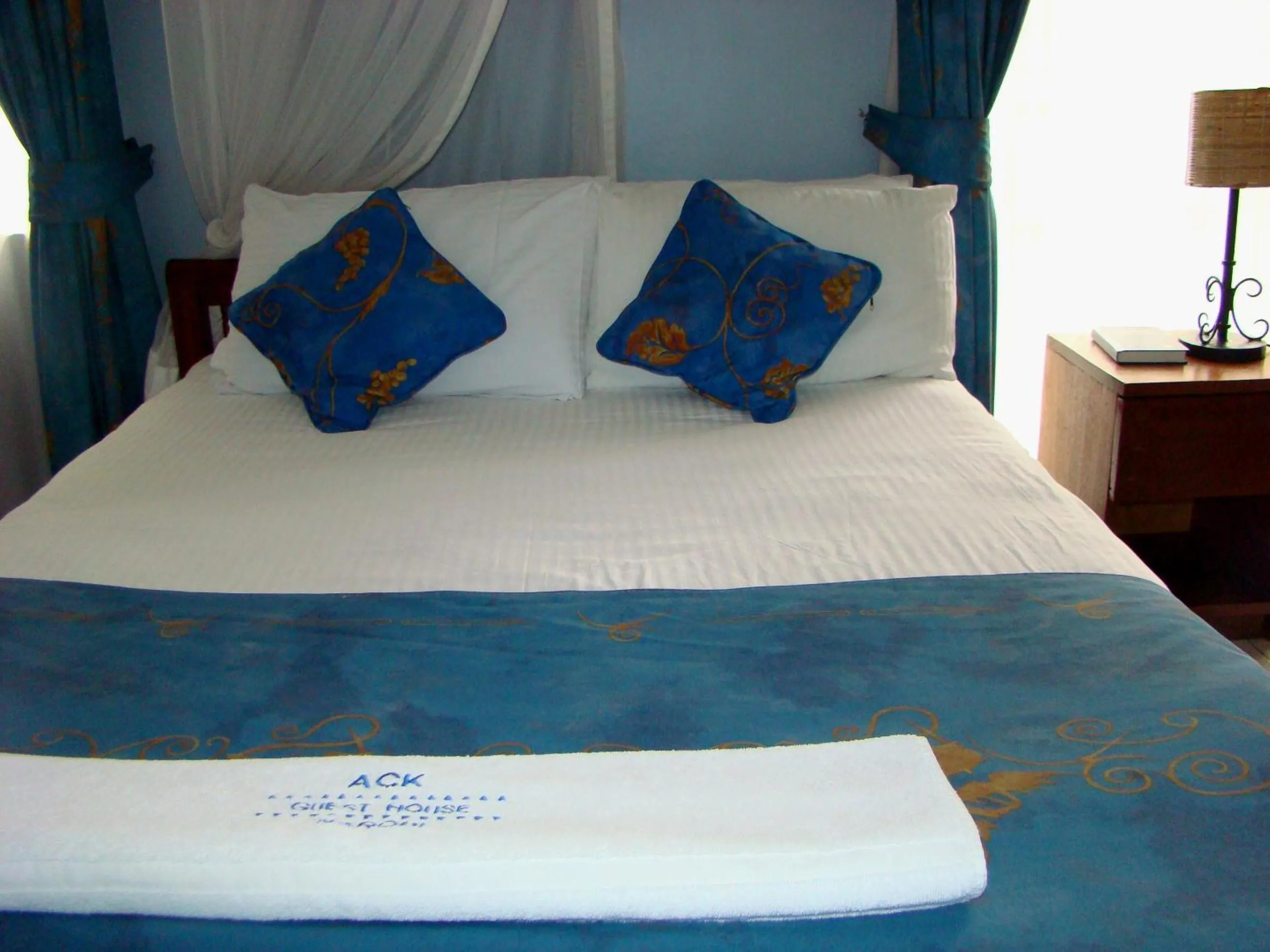 Bed in ACK Guest House Nairobi