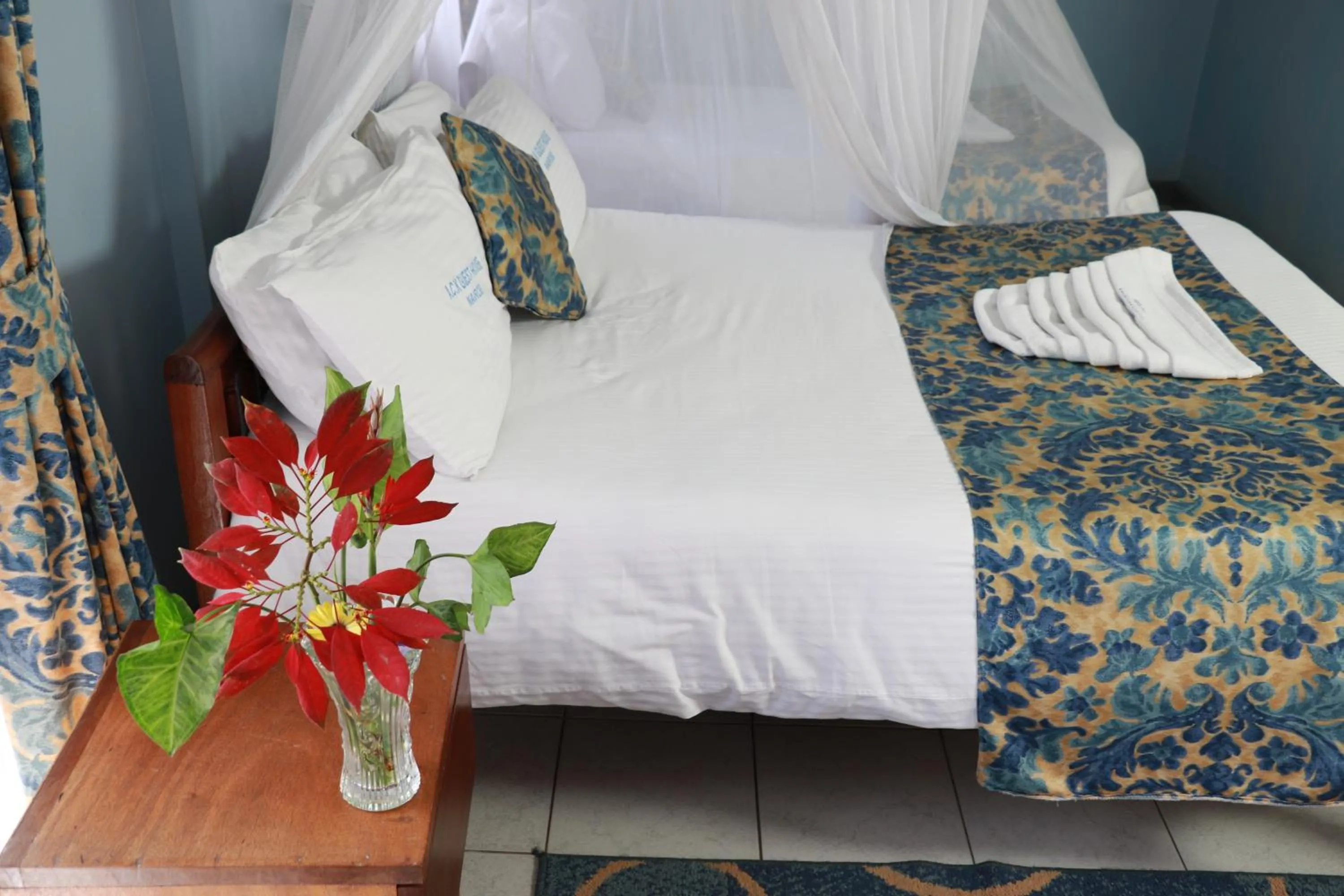 Bed in ACK Guest House Nairobi