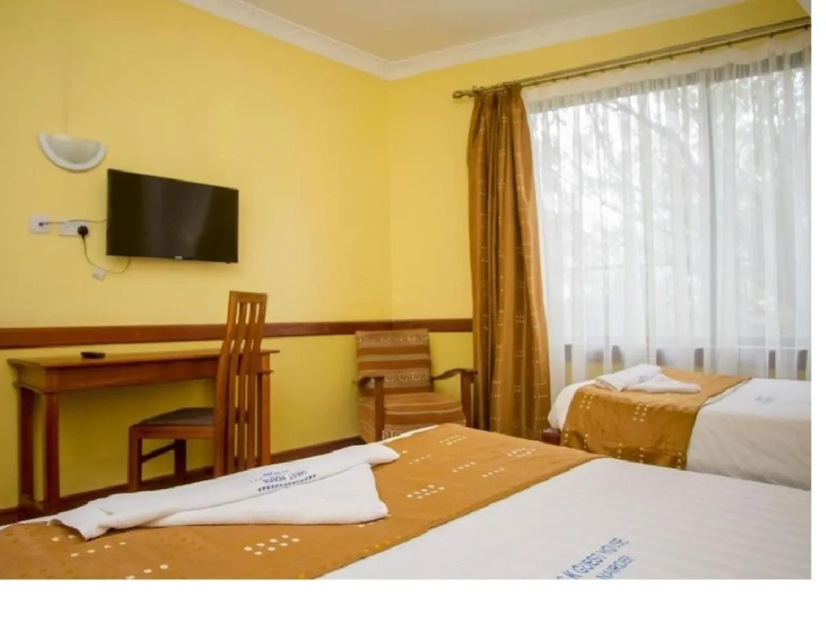 Bed in ACK Guest House Nairobi