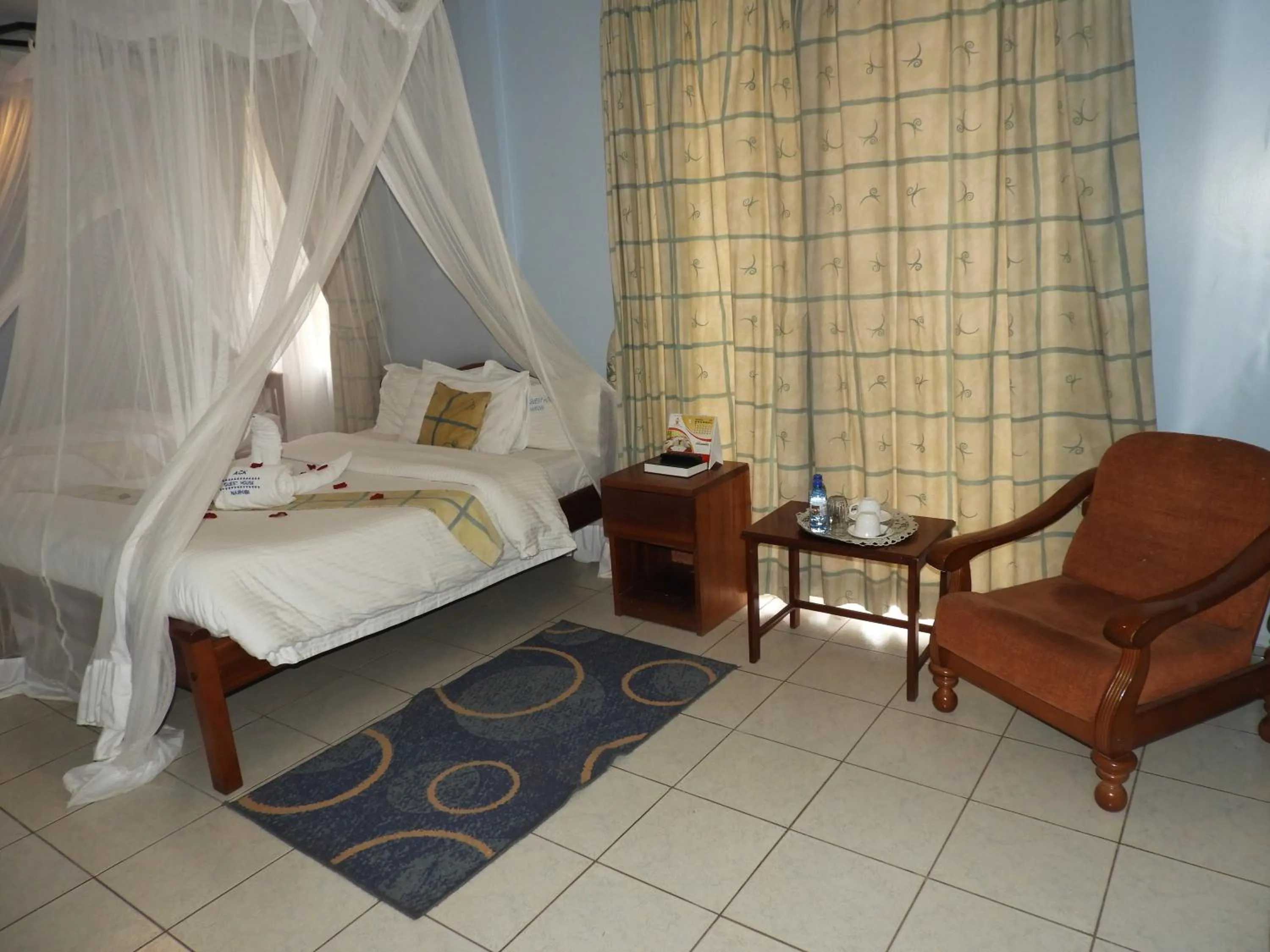 Bed in ACK Guest House Nairobi