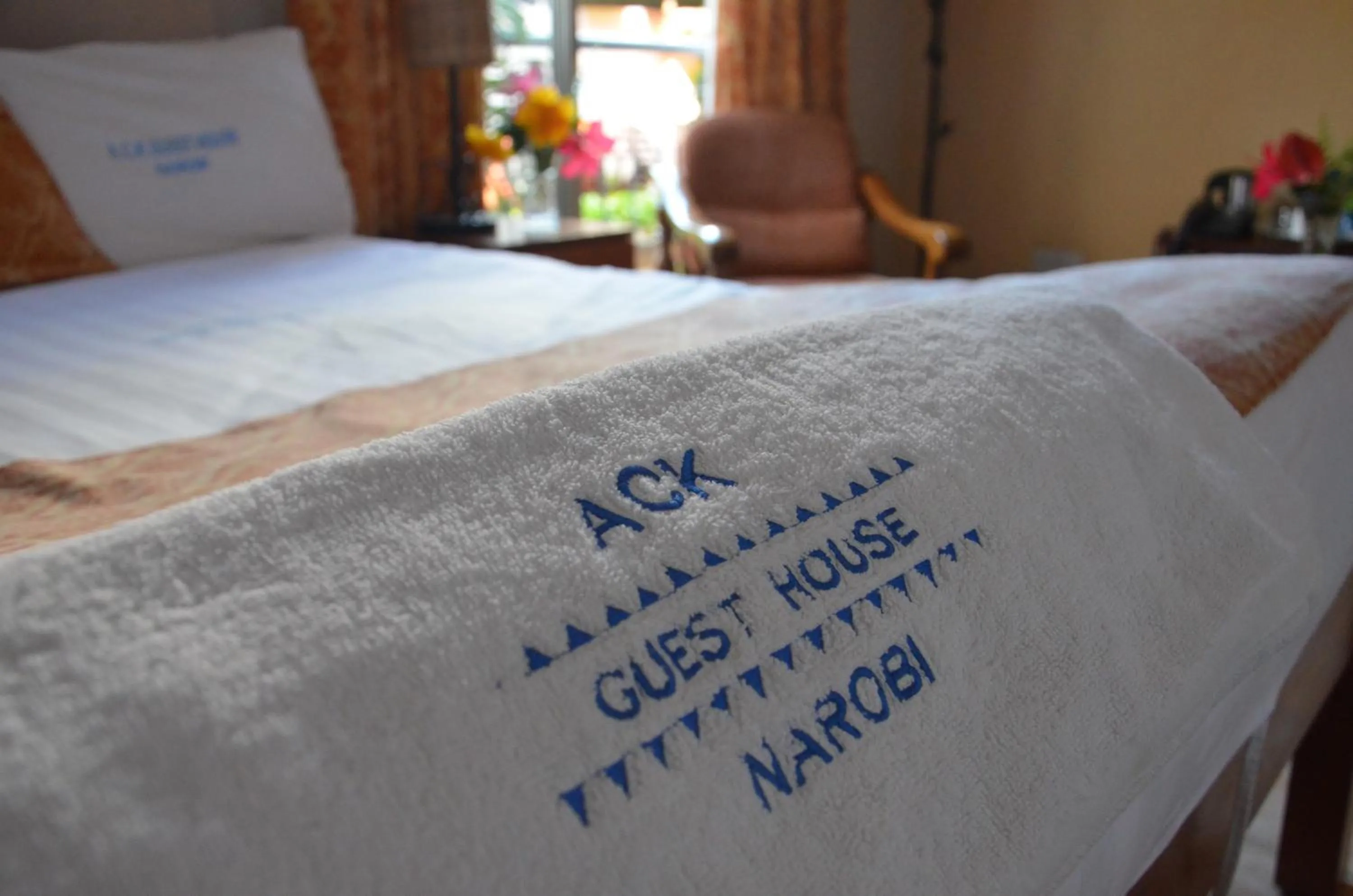 Bed in ACK Guest House Nairobi