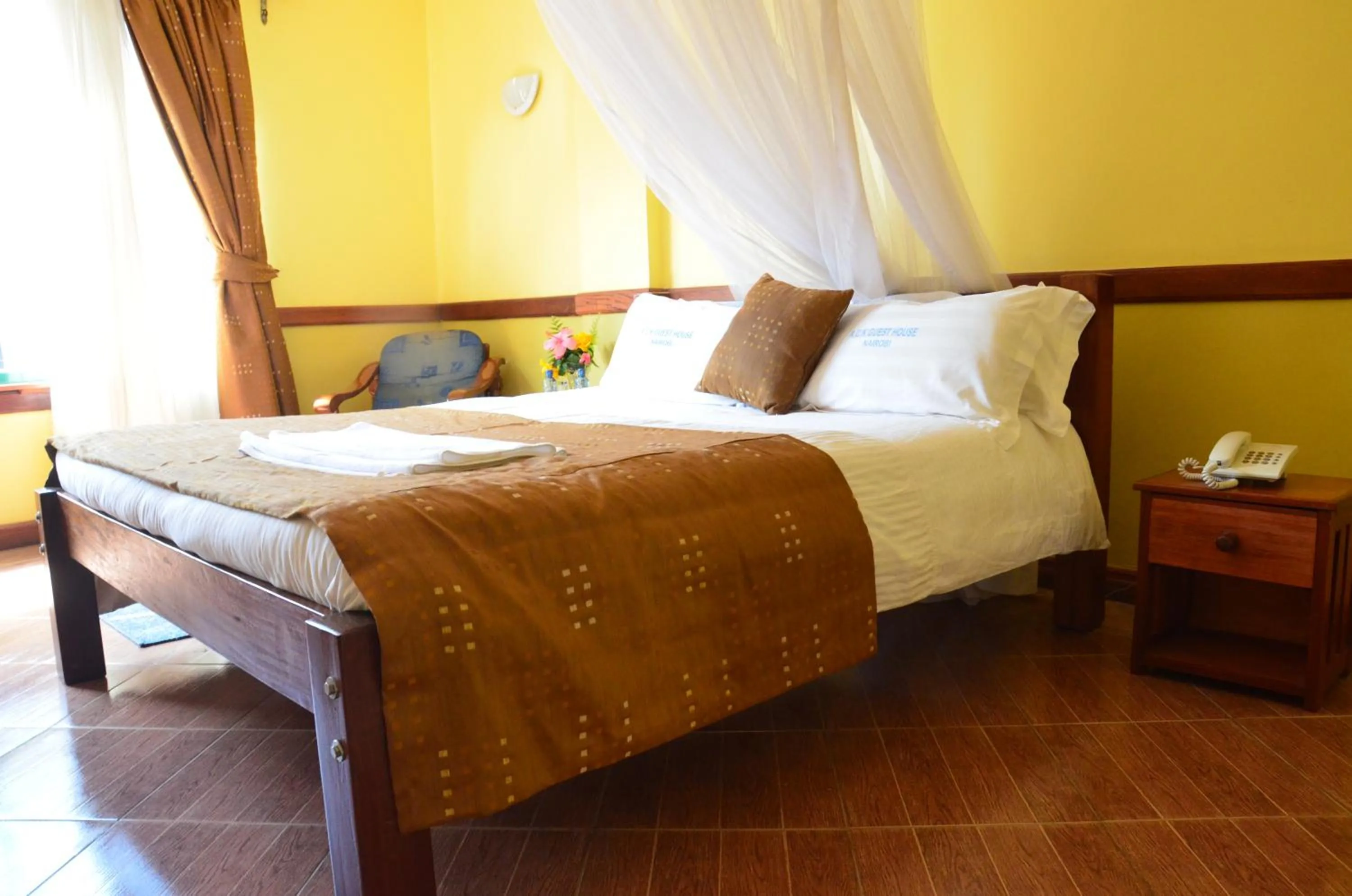 Bed in ACK Guest House Nairobi