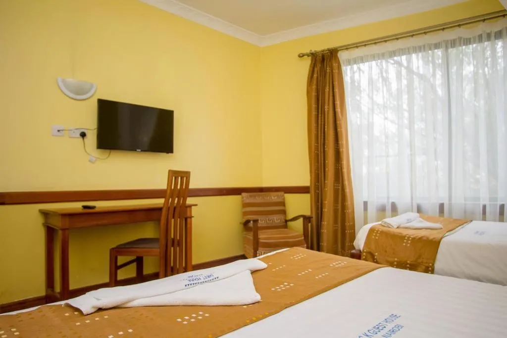 Bed in ACK Guest House Nairobi