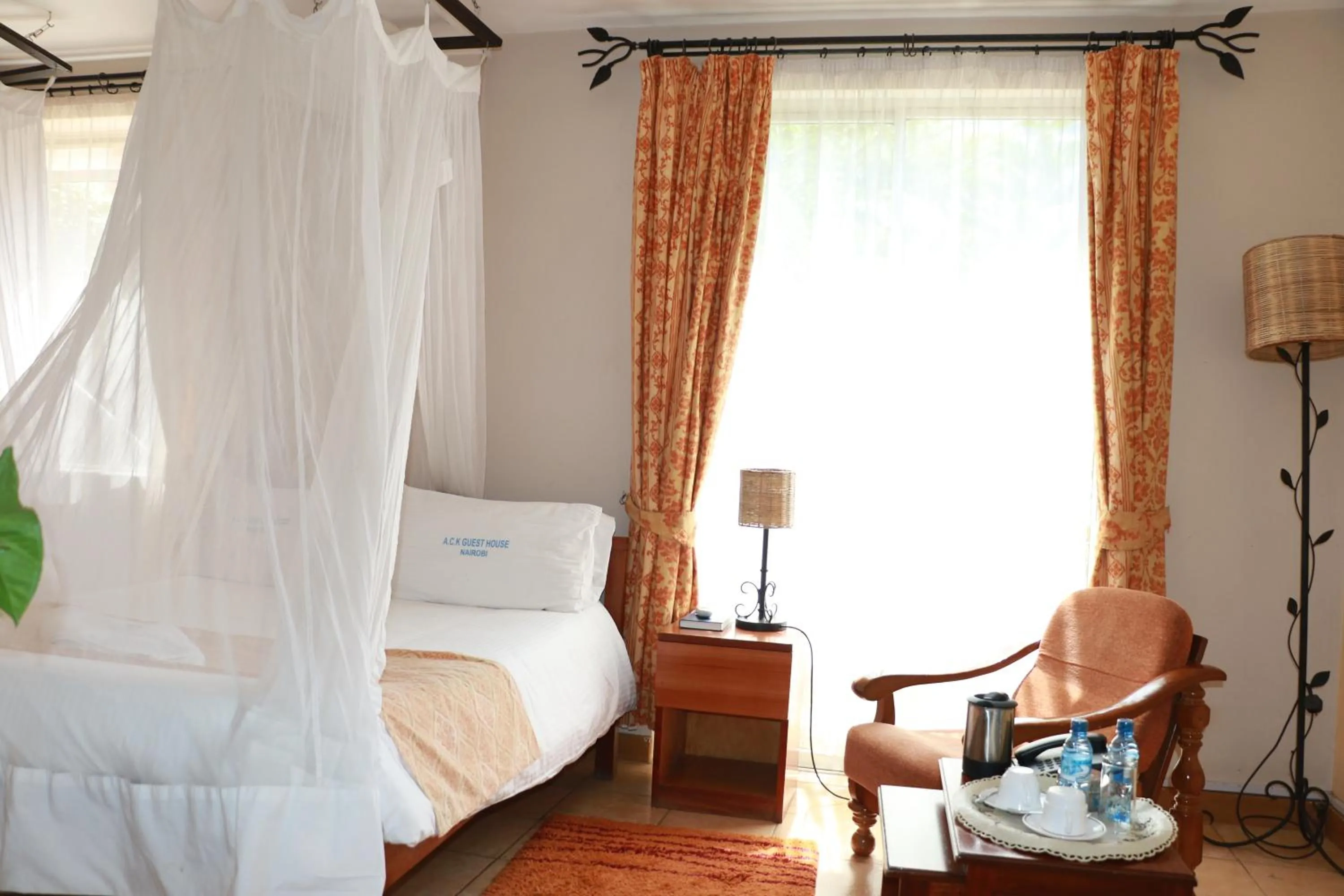 Bed in ACK Guest House Nairobi