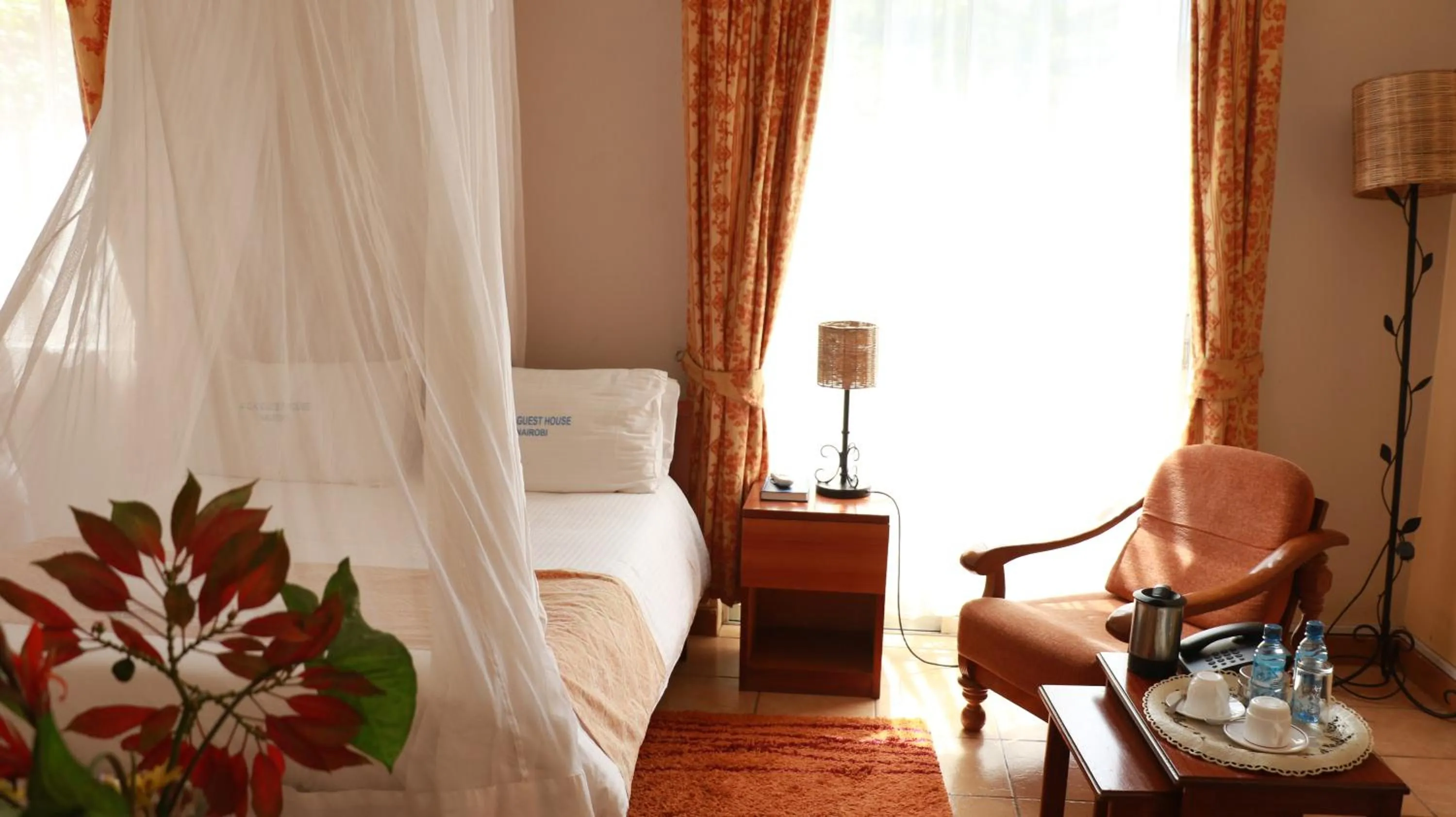 Bed in ACK Guest House Nairobi