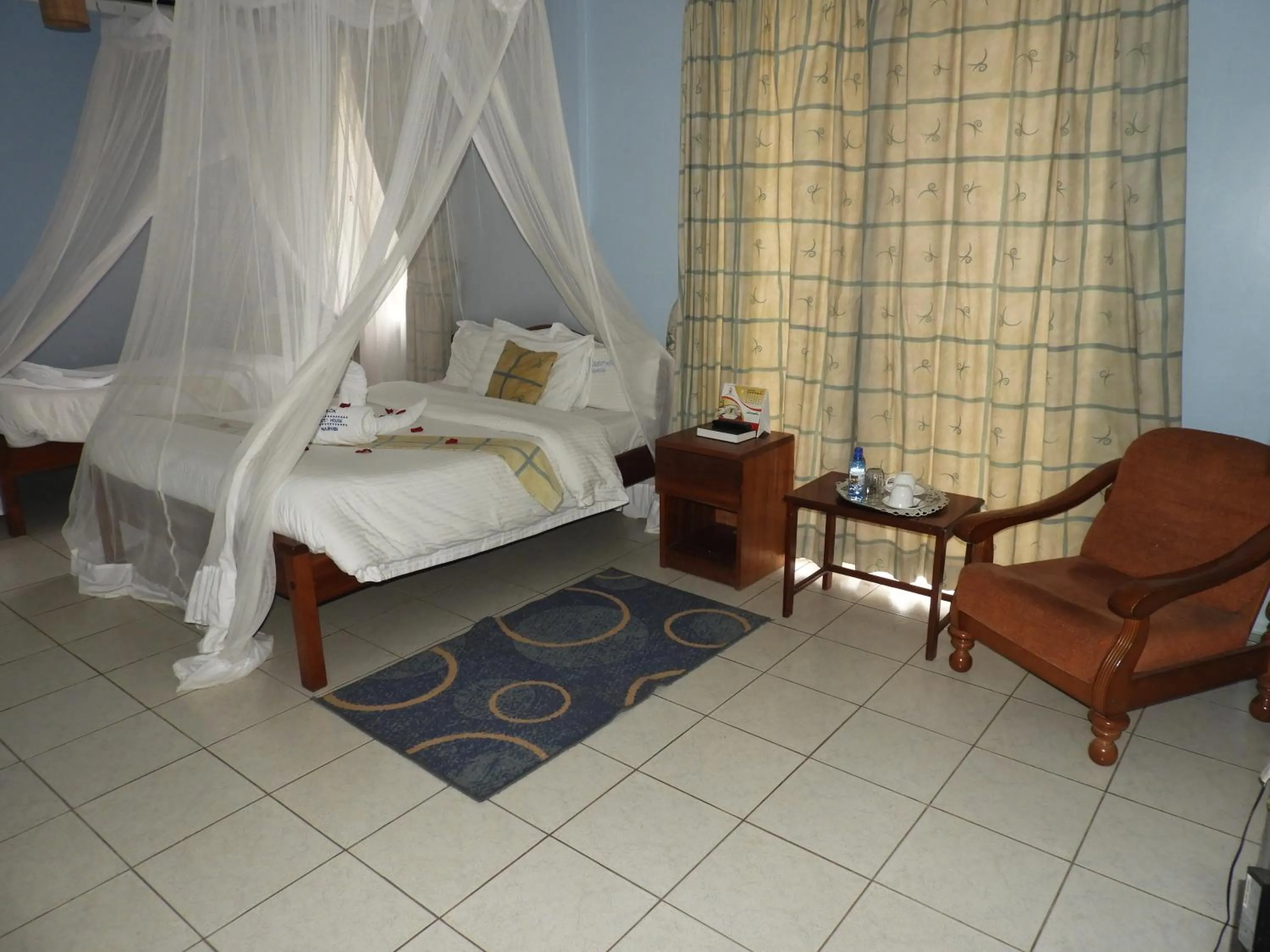 Bed in ACK Guest House Nairobi