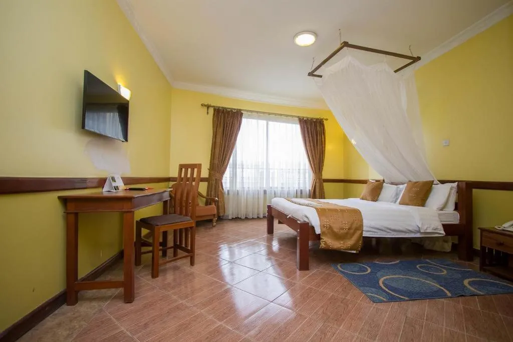 Bed in ACK Guest House Nairobi