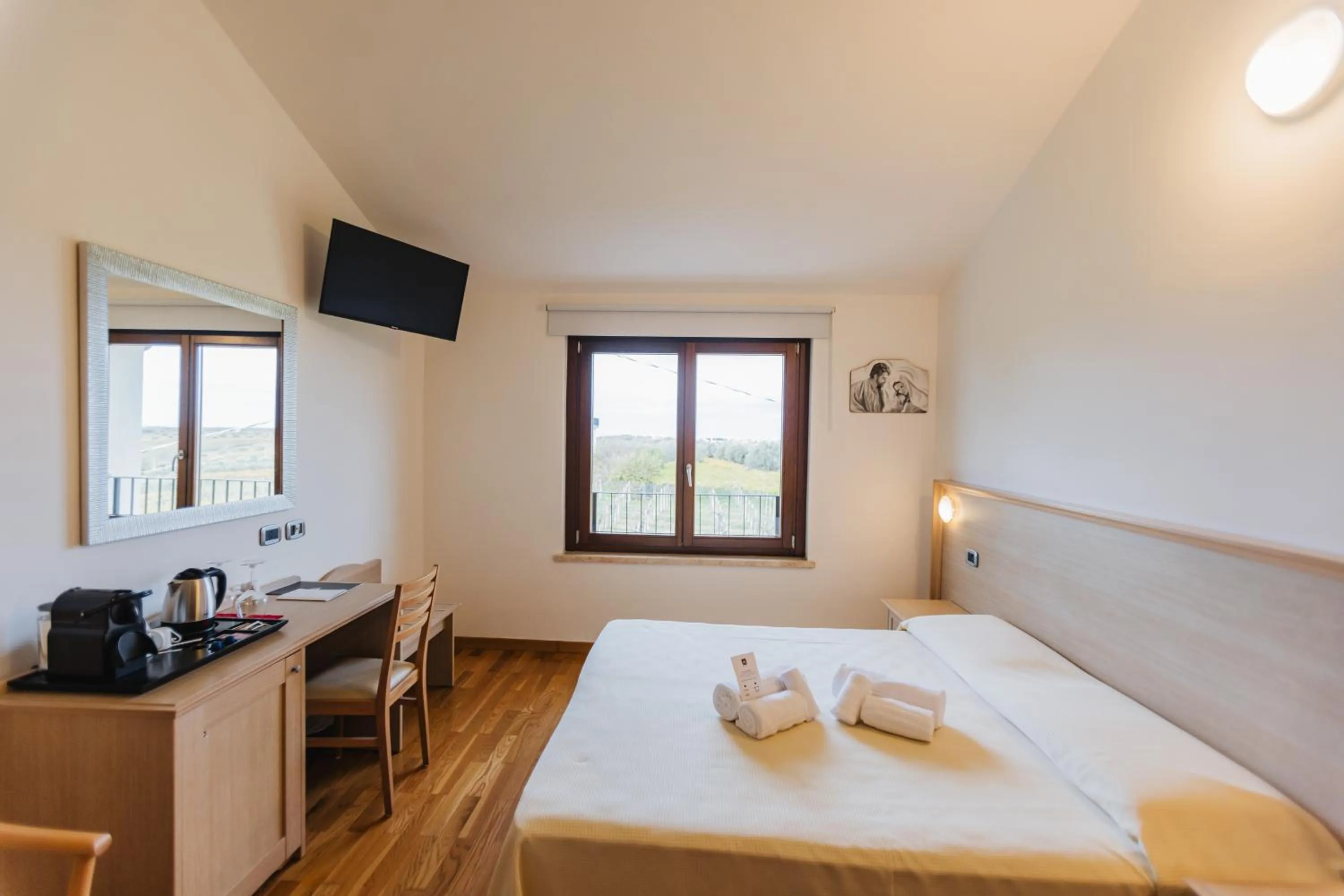 Bed in Magnificat Hotel&Resort