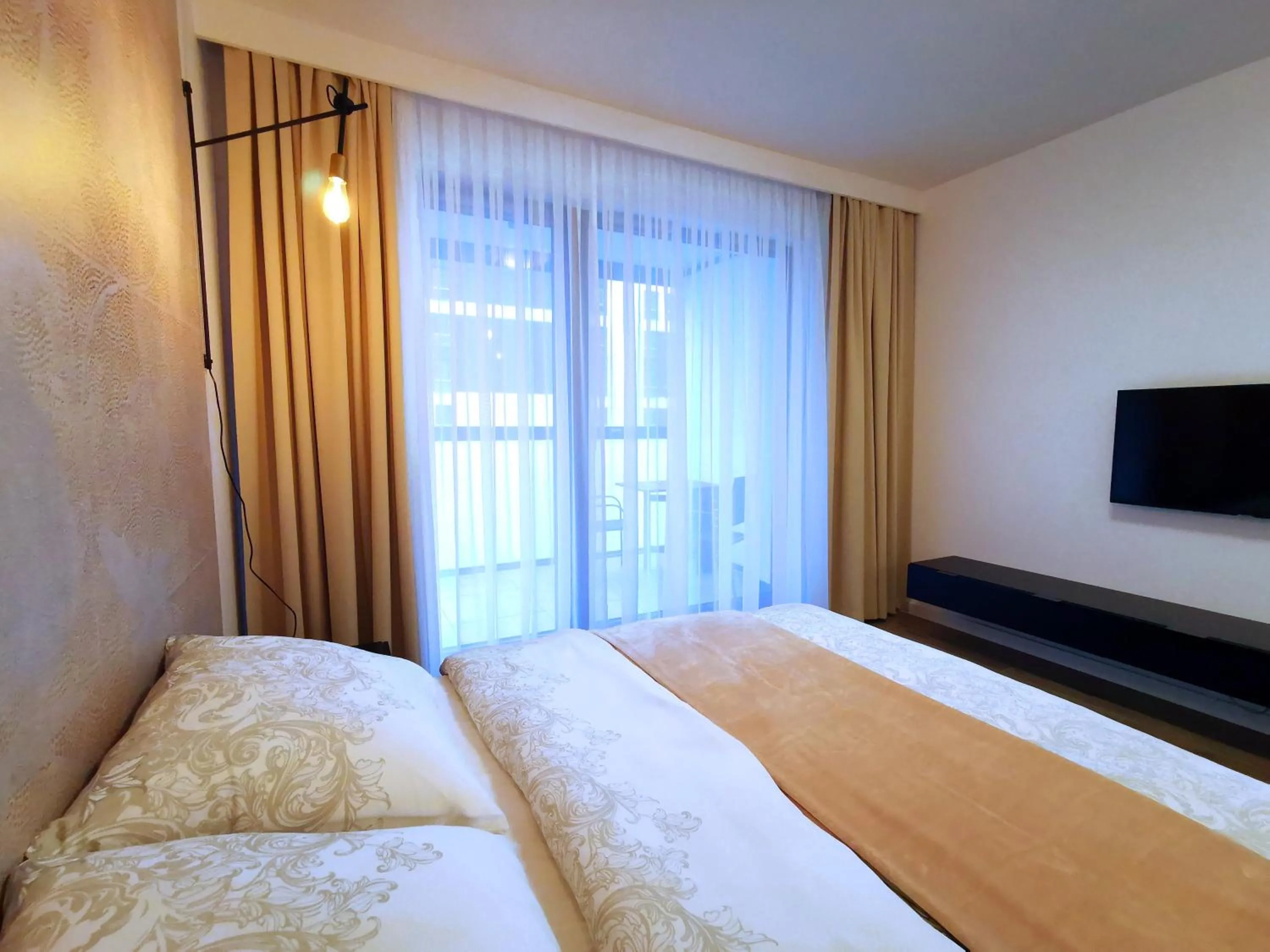 Bed in Come&Stay apartments Wola
