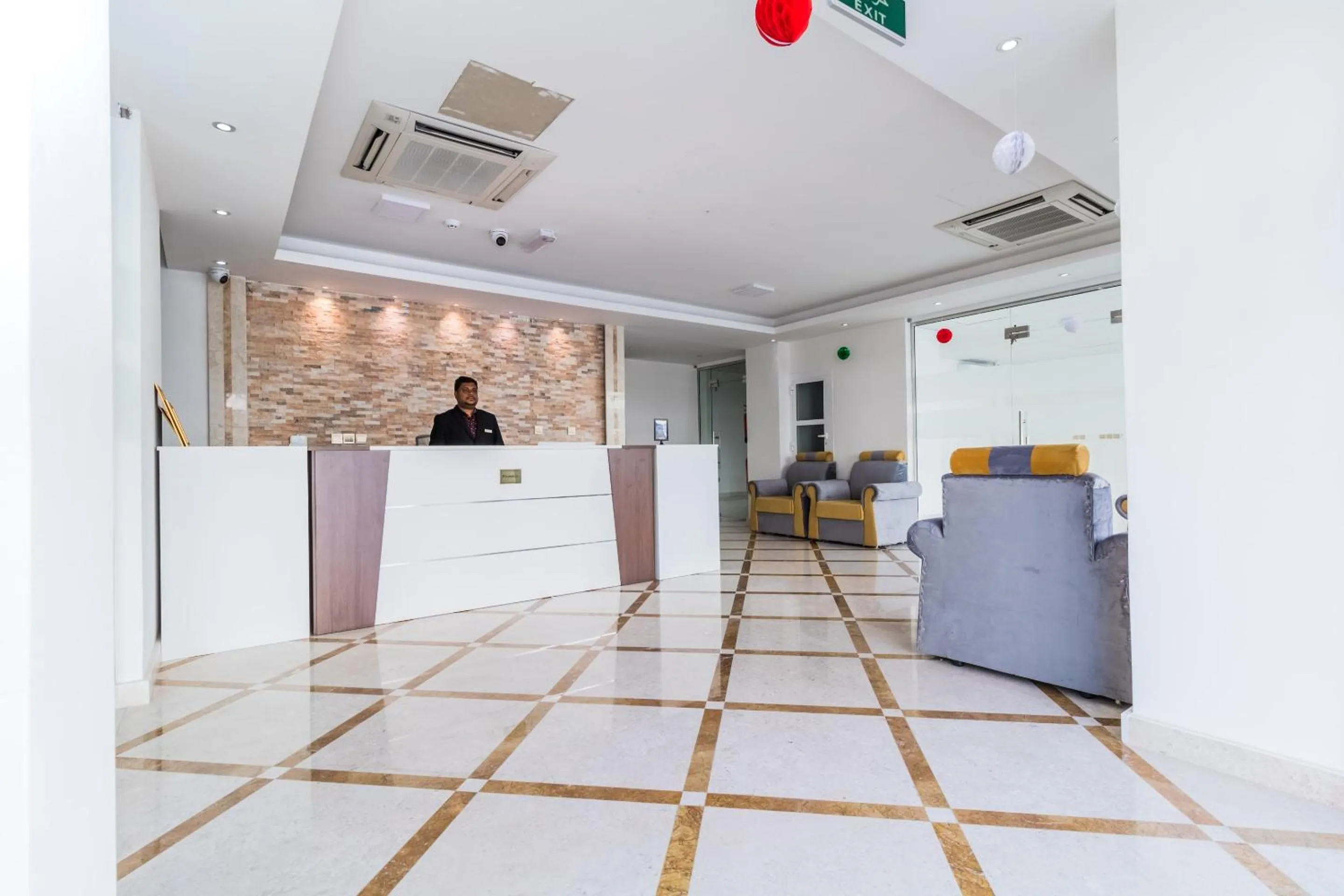 Lobby or reception in Super OYO 106 Muscat Grand Hotel Apartment