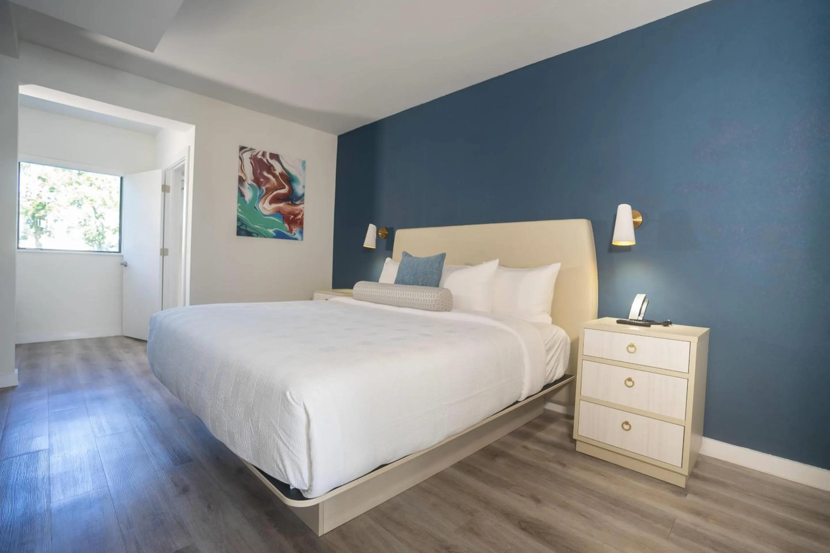 Bedroom, Bed in DASKK Orlando Hotel near Universal Blvd, an Ascend Collection Hotel