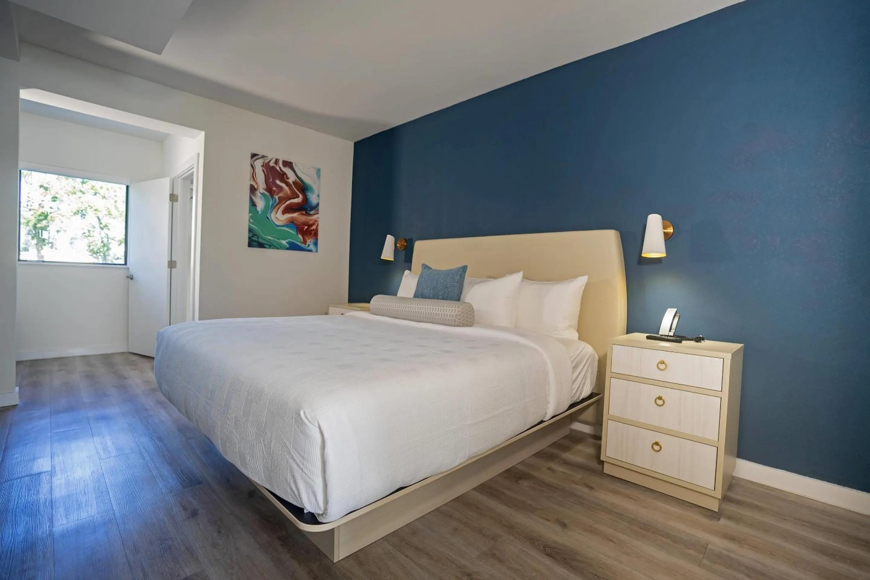 Bedroom, Bed in DASKK Orlando Hotel near Universal Blvd, an Ascend Collection Hotel