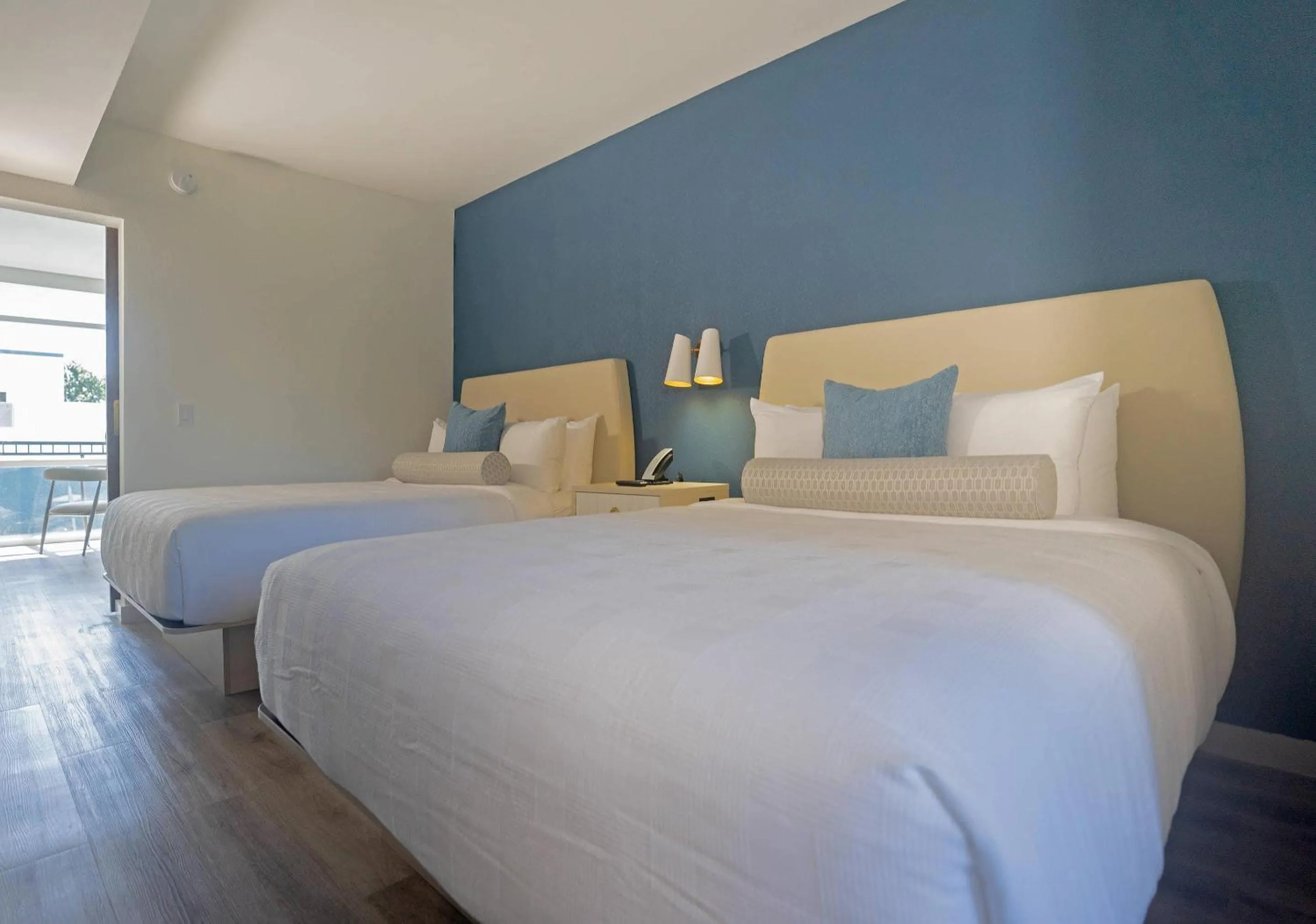 Bedroom, Bed in DASKK Orlando Hotel near Universal Blvd, an Ascend Collection Hotel